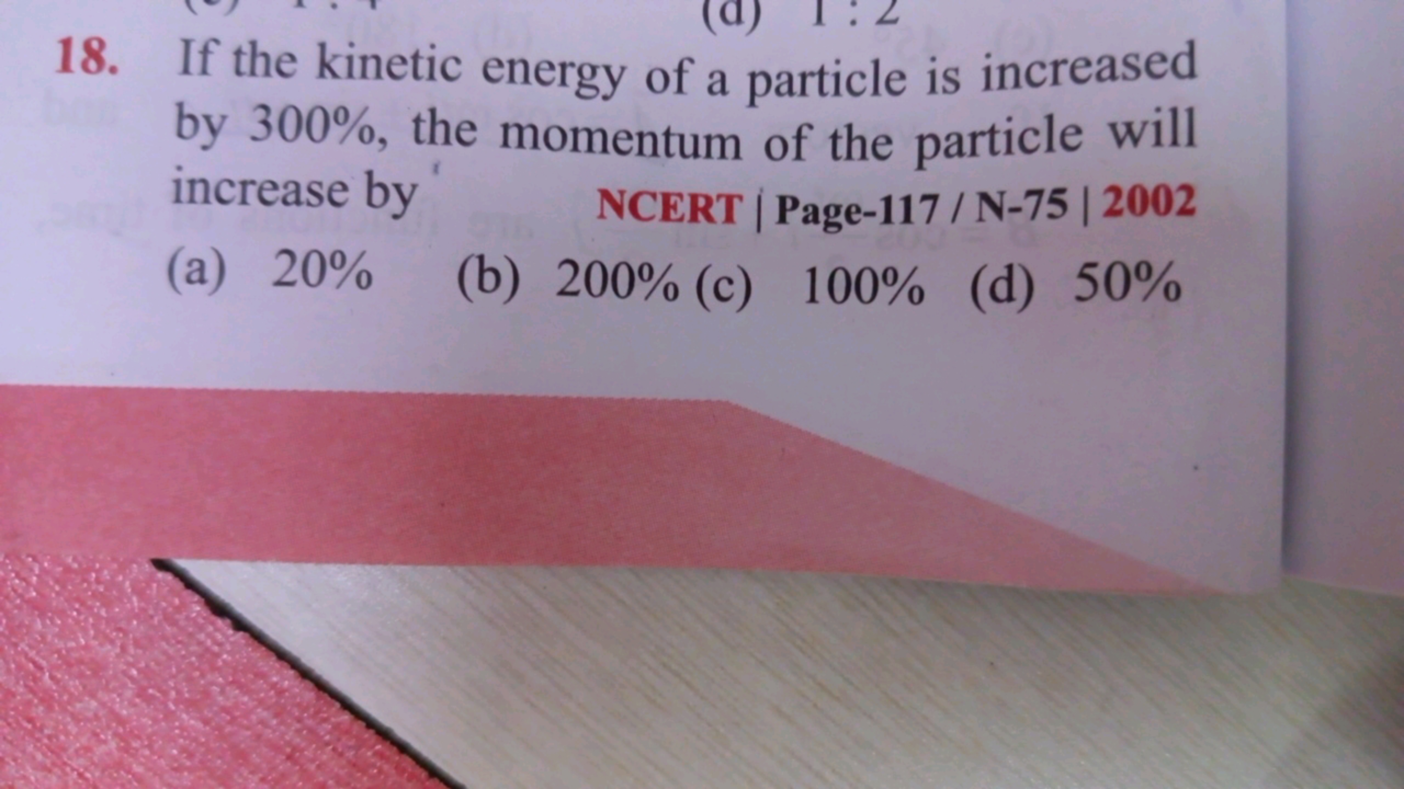 18. If the kinetic energy of a particle is increased by 300%, the mome