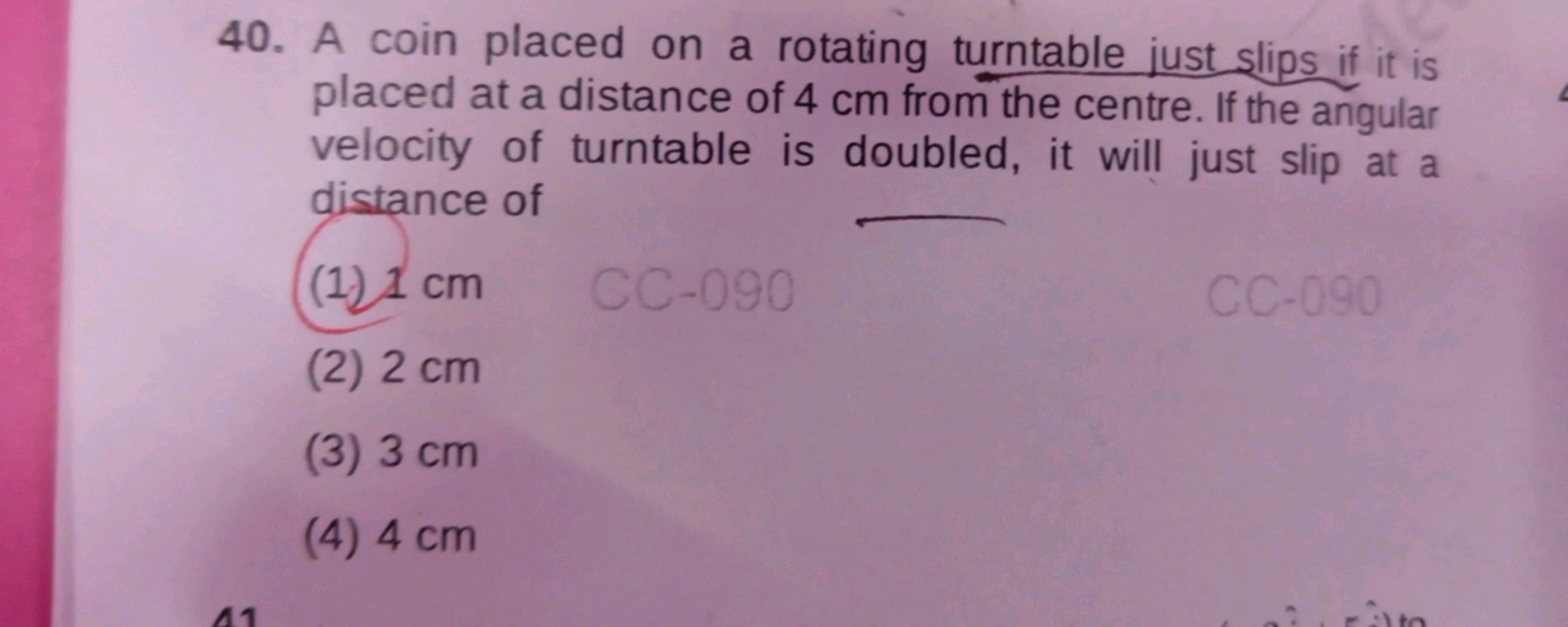 40. A coin placed on a rotating turntable just slips if it is placed a