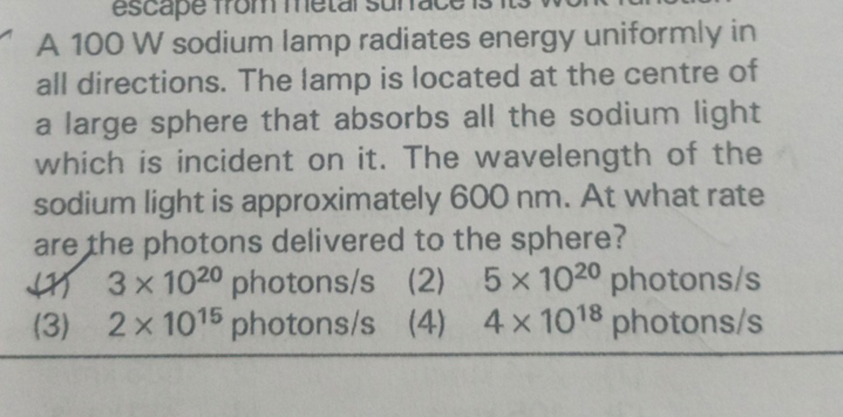 A 100 W sodium lamp radiates energy uniformly in all directions. The l