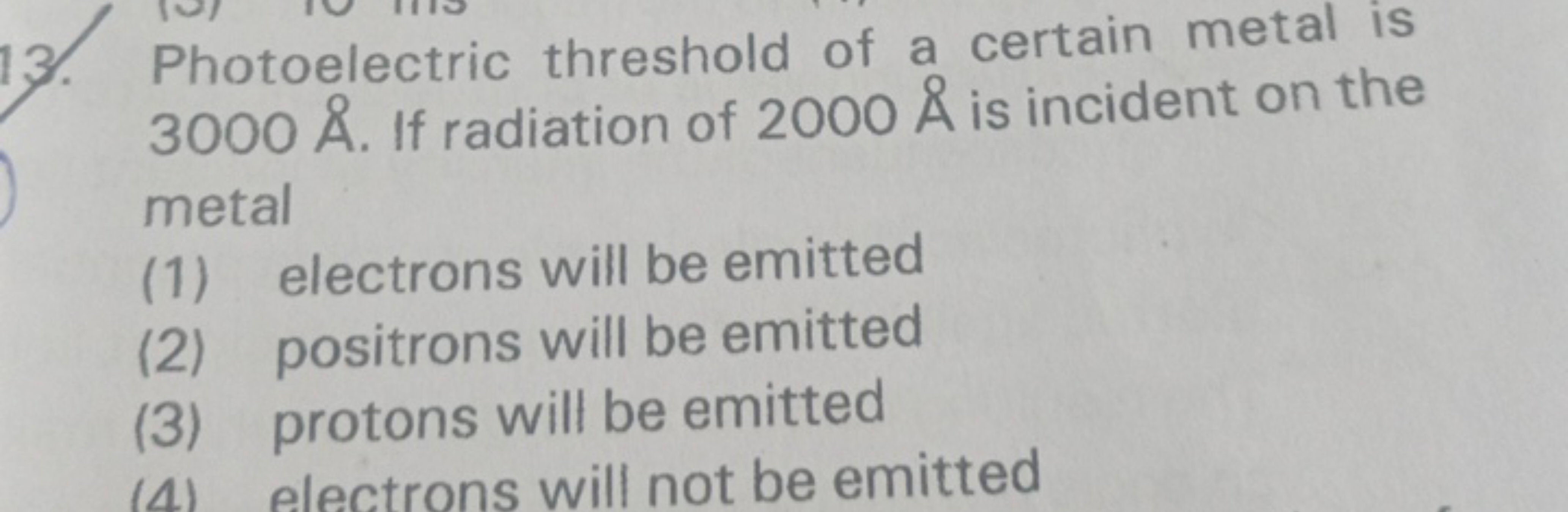 13. Photoelectric threshold of a certain metal is 3000A˚. If radiation