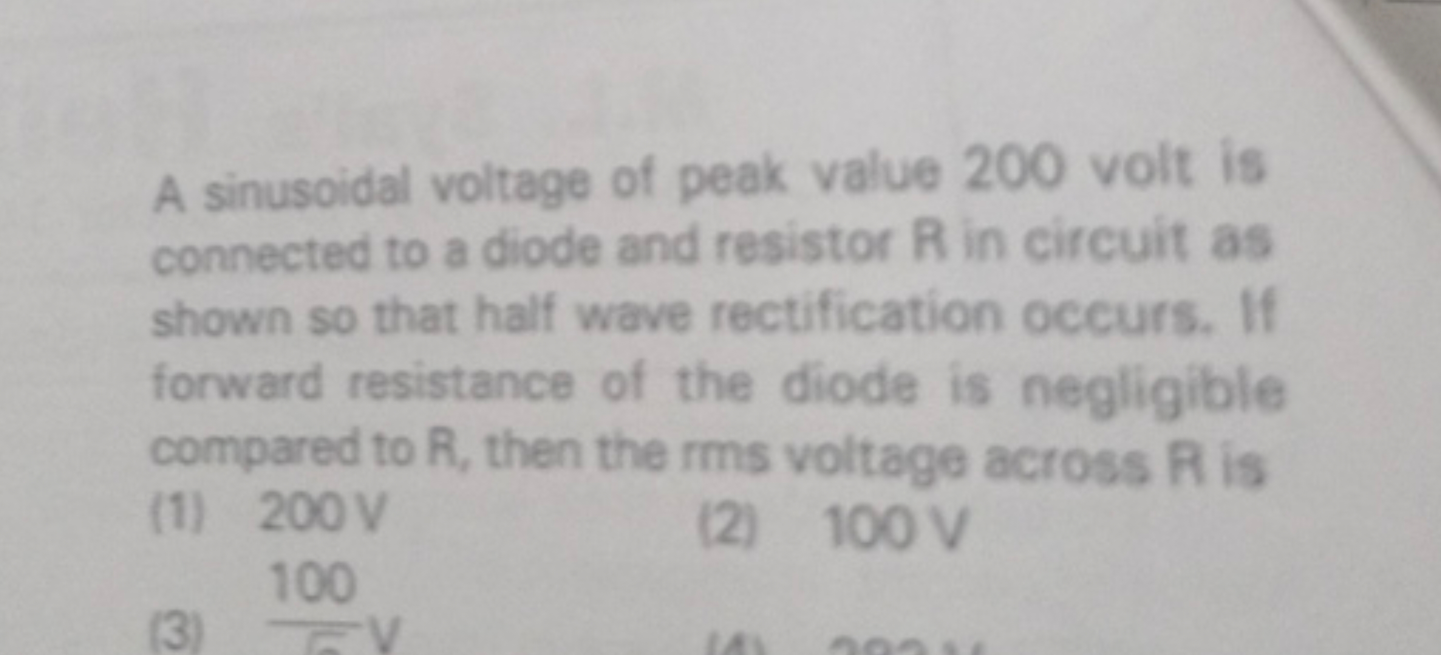 A sinusoidal voltage of peak value 200 volt is connected to a diode an