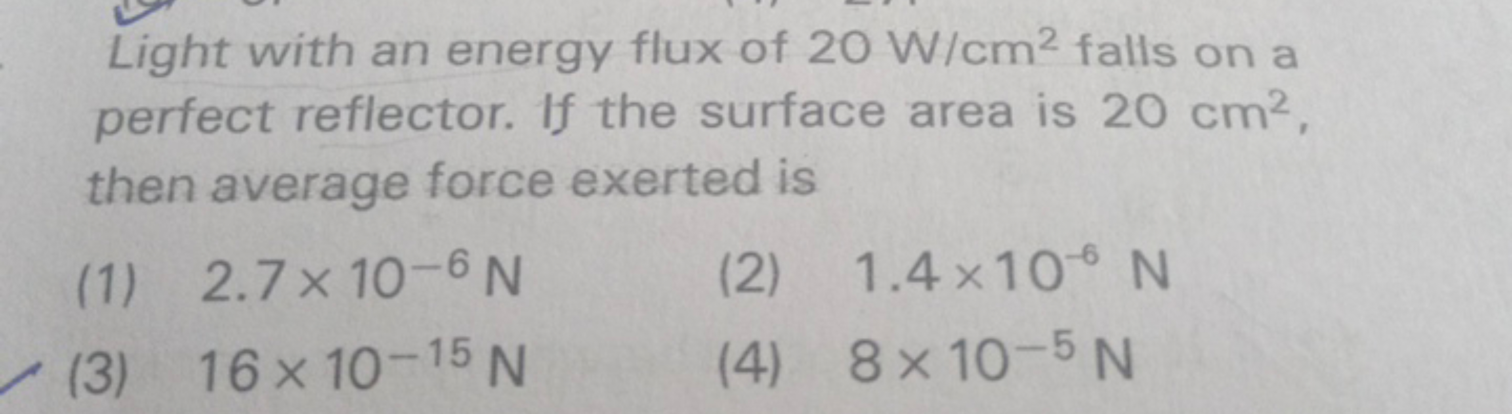 Light with an energy flux of 20 W/cm2 falls on a perfect reflector. If