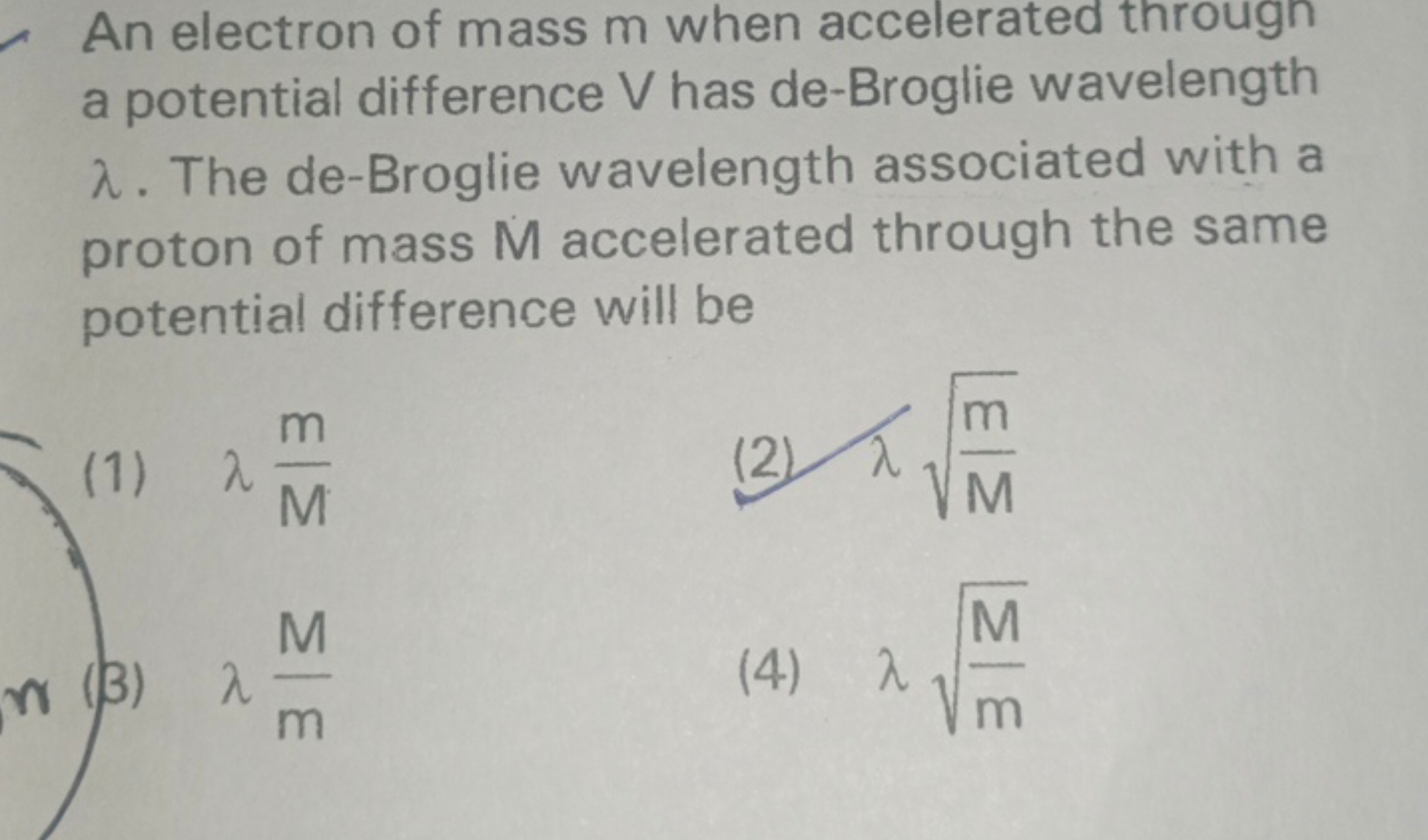 An electron of mass m when accelerated througn a potential difference 