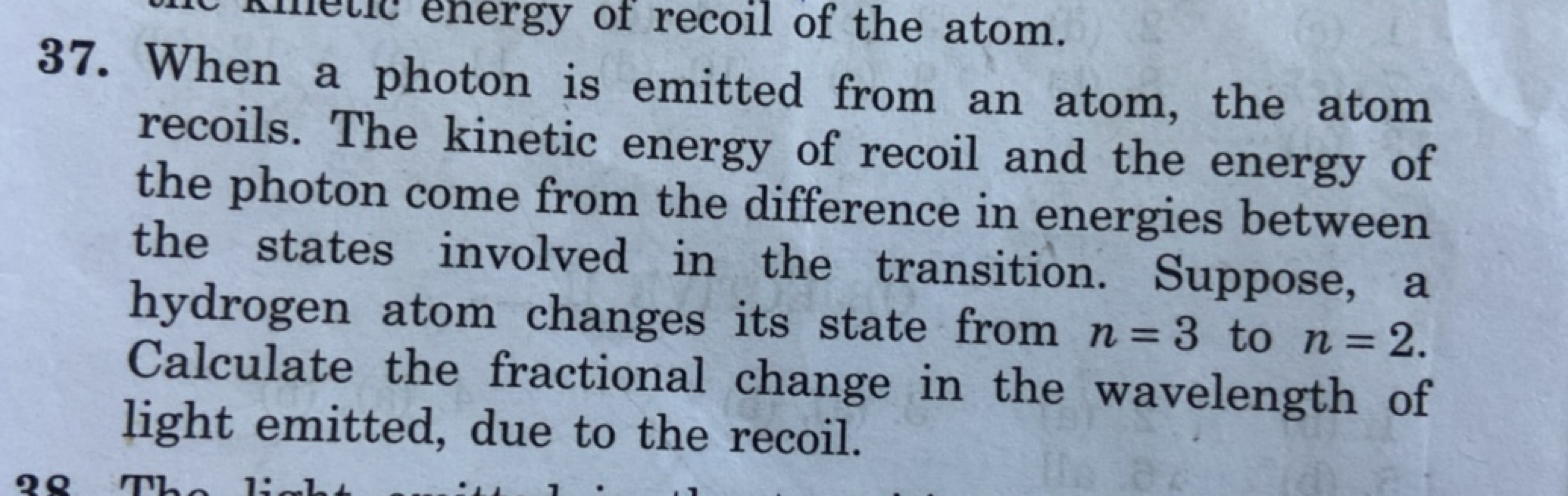 37. When a photon is emitted from an atom, the atom recoils. The kinet