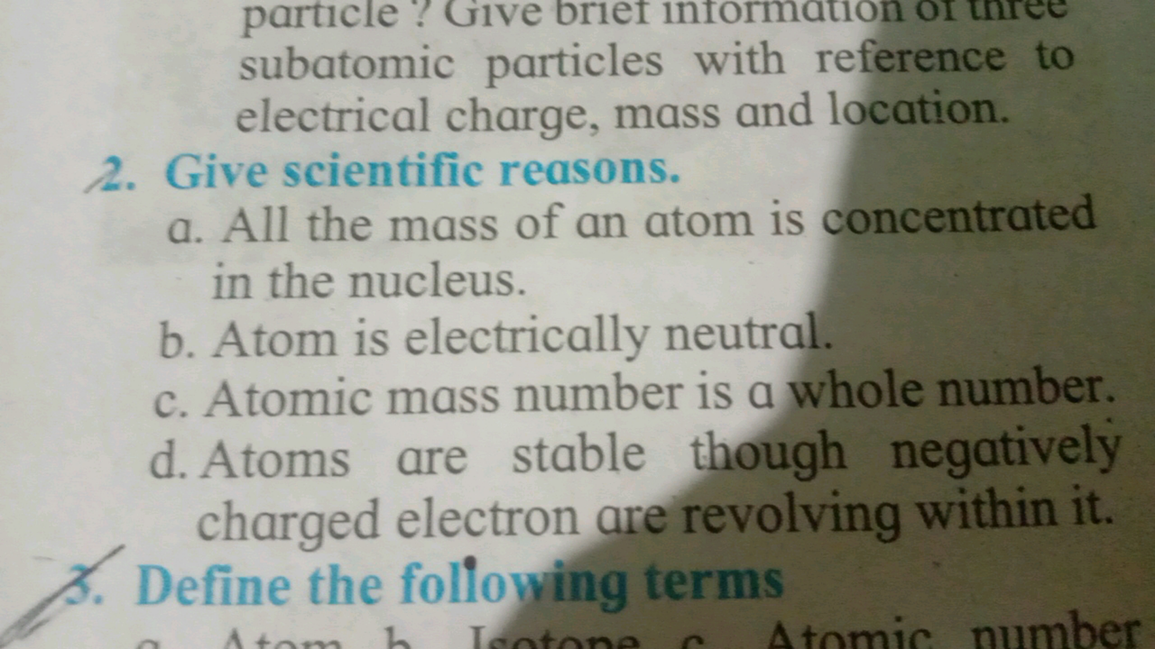 particle? Give briet information or three subatomic particles with ref