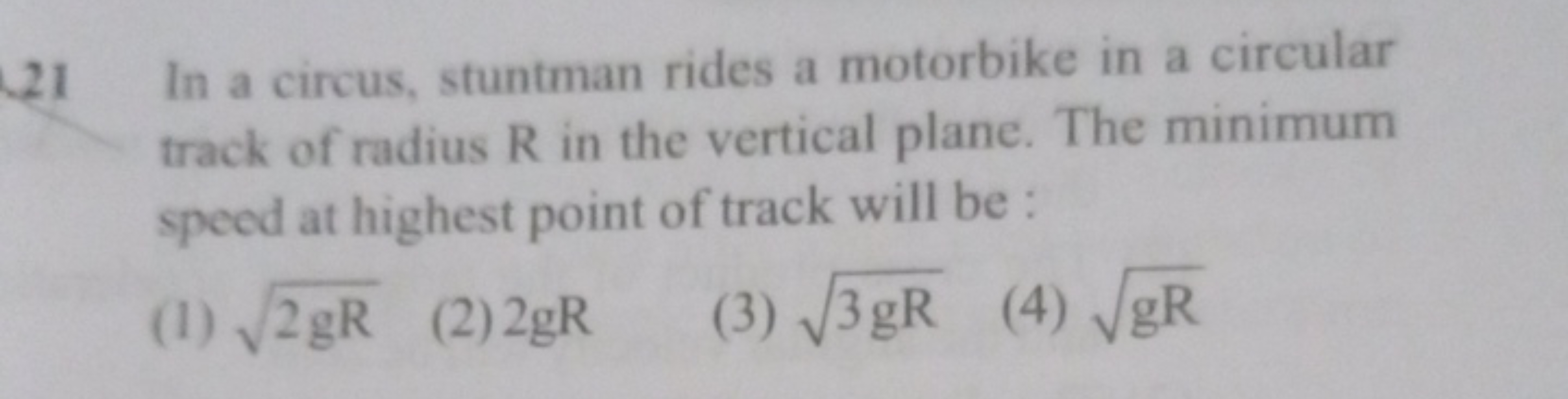 21 In a circus, stuntman rides a motorbike in a circular track of radi