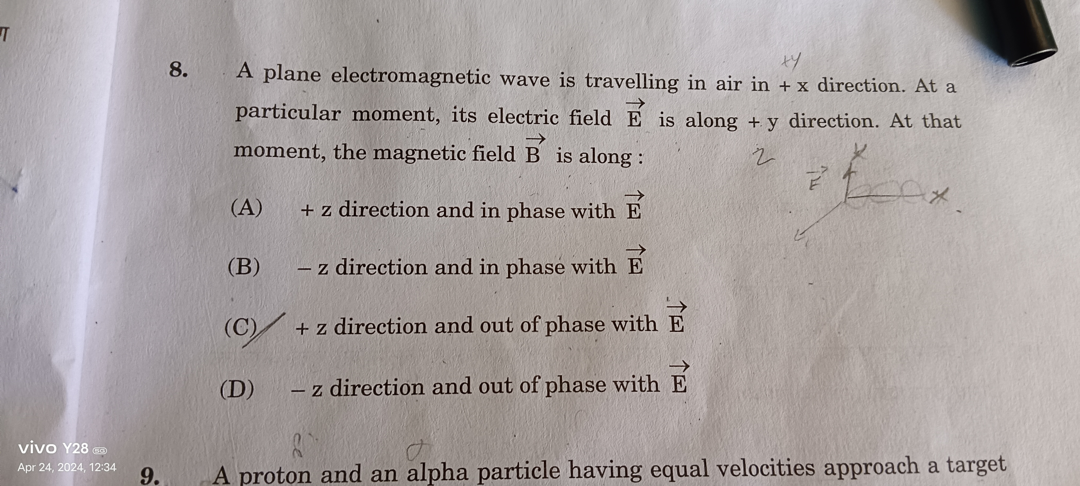 A plane electromagnetic wave is travelling in air in +x direction. At 