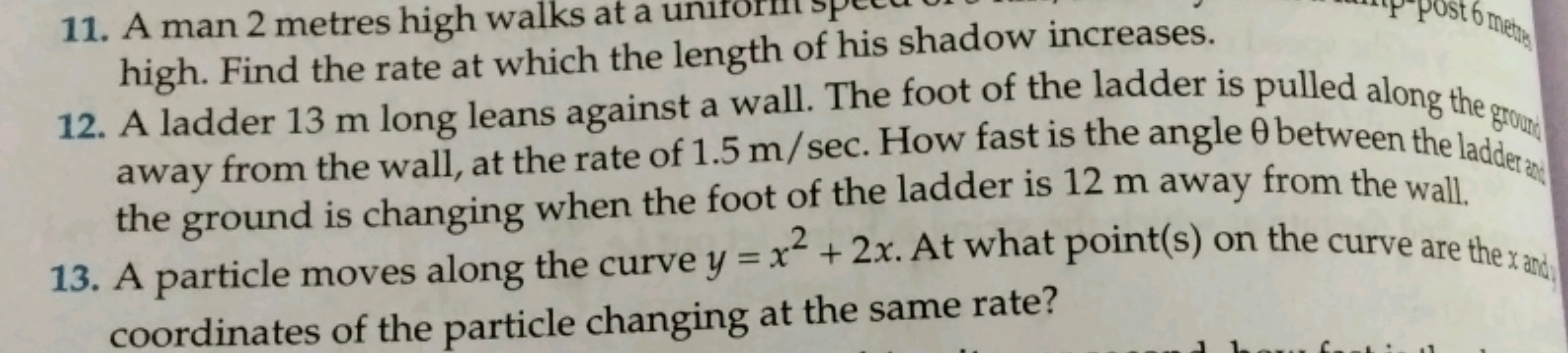 11. A man 2 metres high walks at a high. Find the rate at which the le