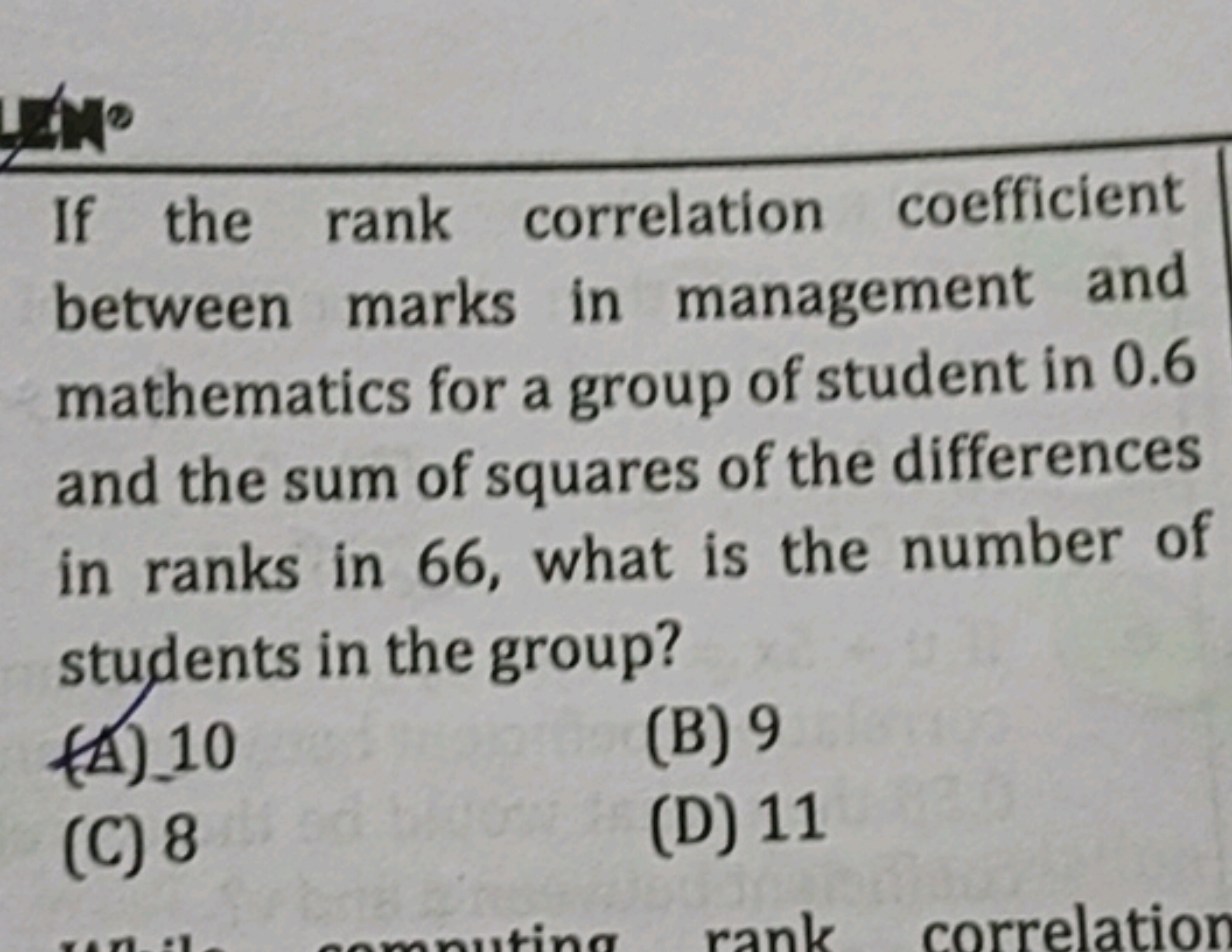 If the rank correlation coefficient between marks in management and ma