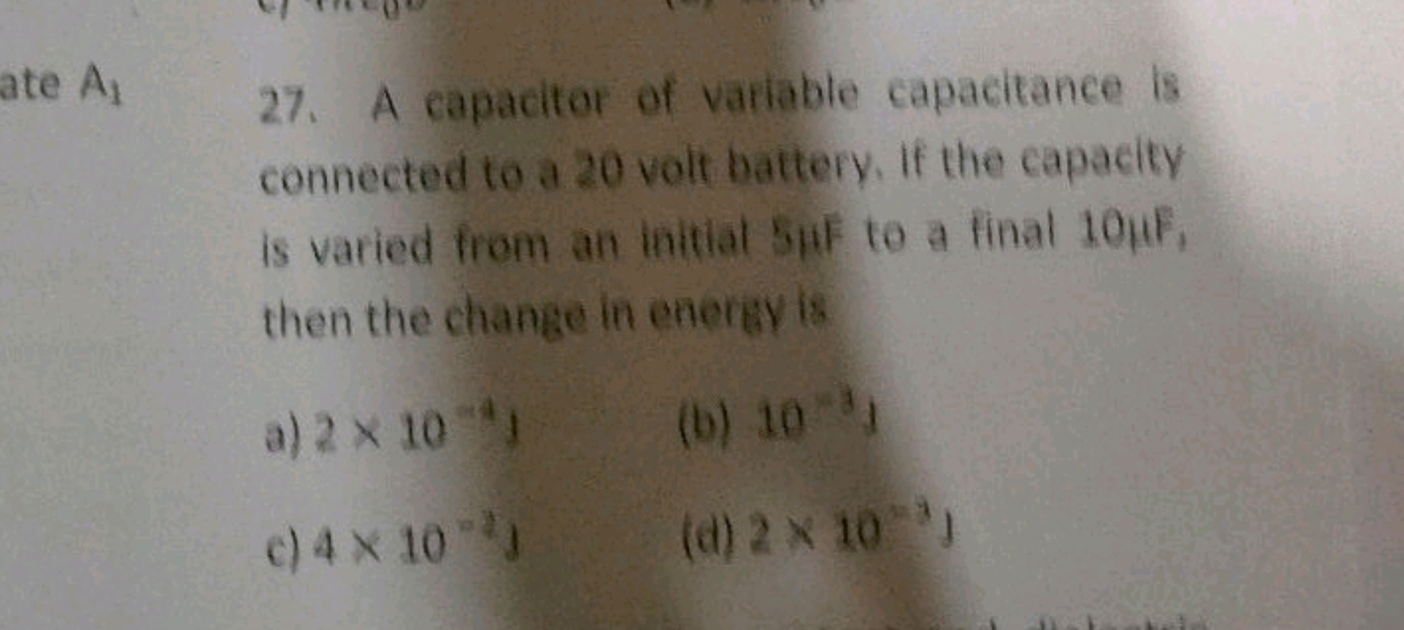 27. A capacitor of variable capacitance is connected to a 20 volt batt