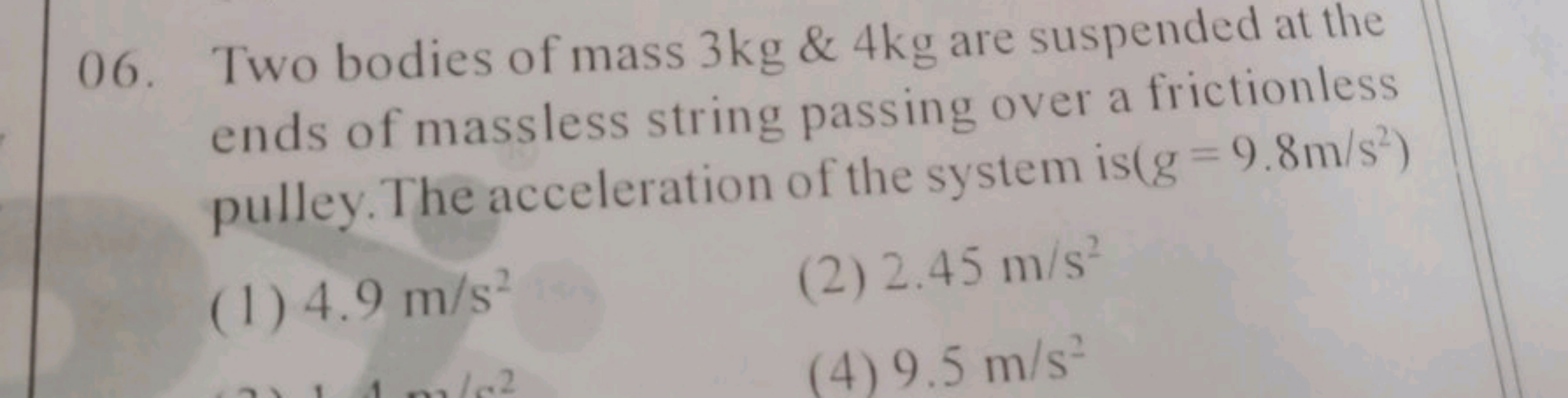 06. Two bodies of mass 3 kg&4 kg are suspended at the ends of massless