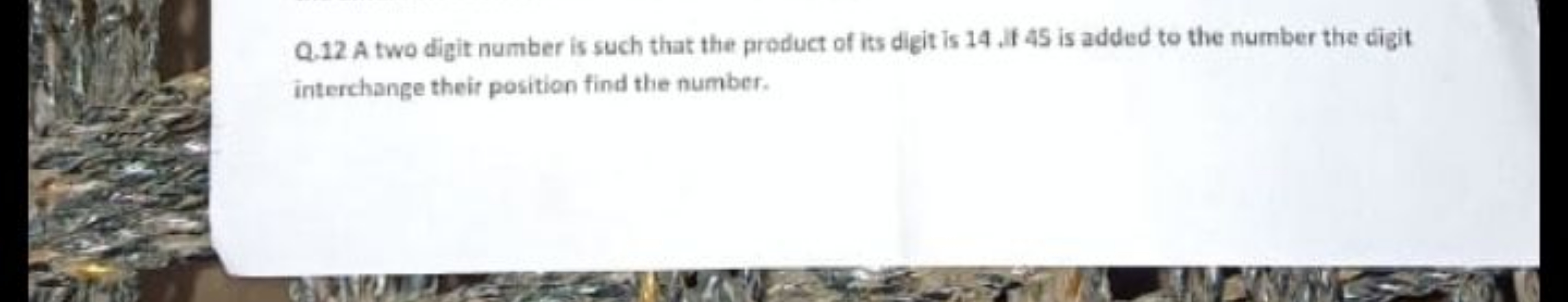 Q.12. A two digit number is such that the product of its digit is 14 ,