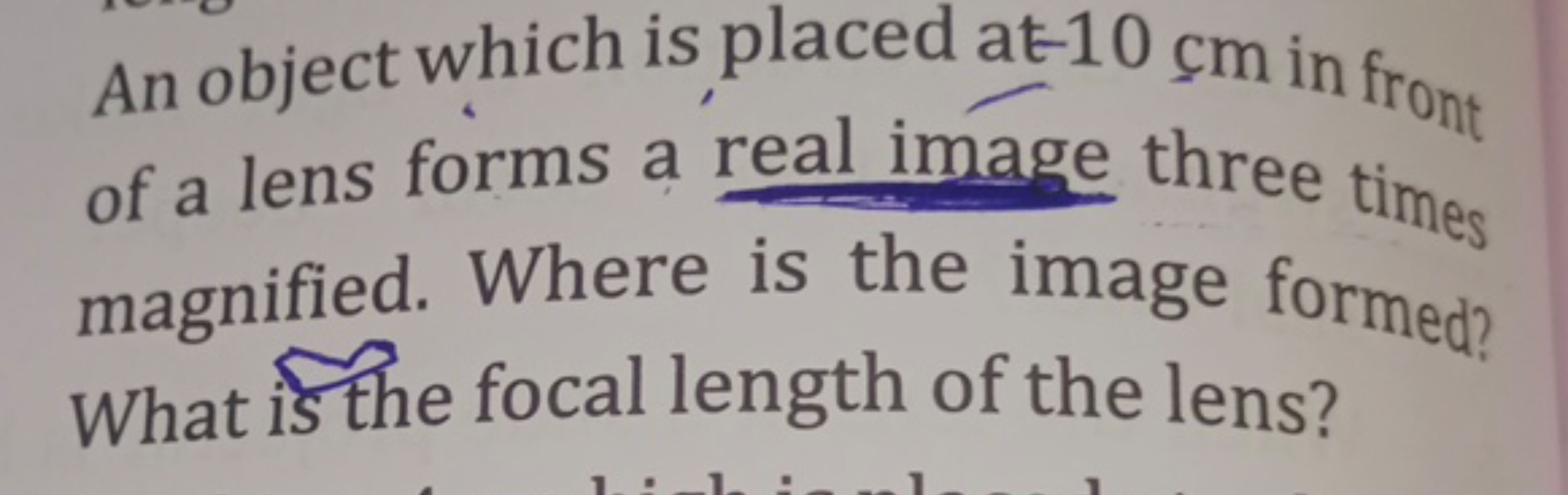 An object which is placed at -10 cm in front of a lens forms a real im