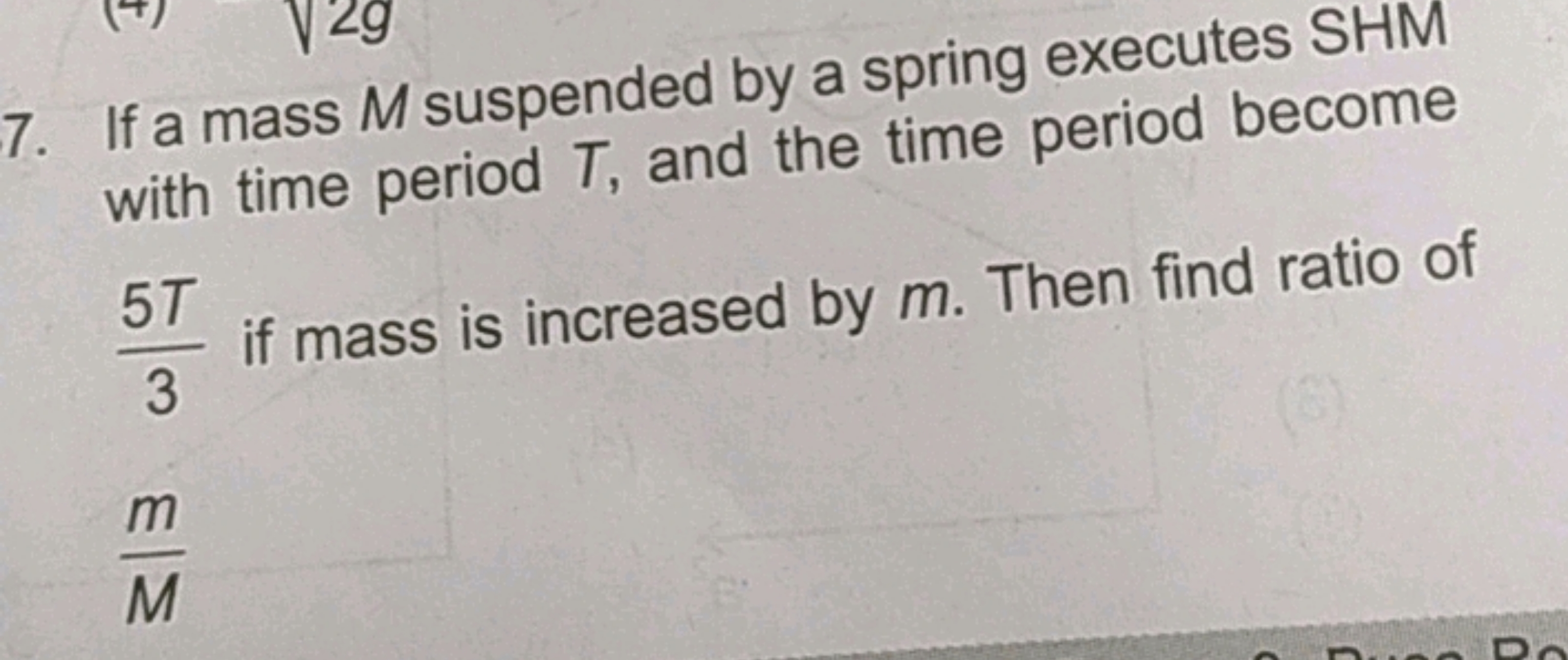 7. If a mass M suspended by a spring executes SHM with time period T, 