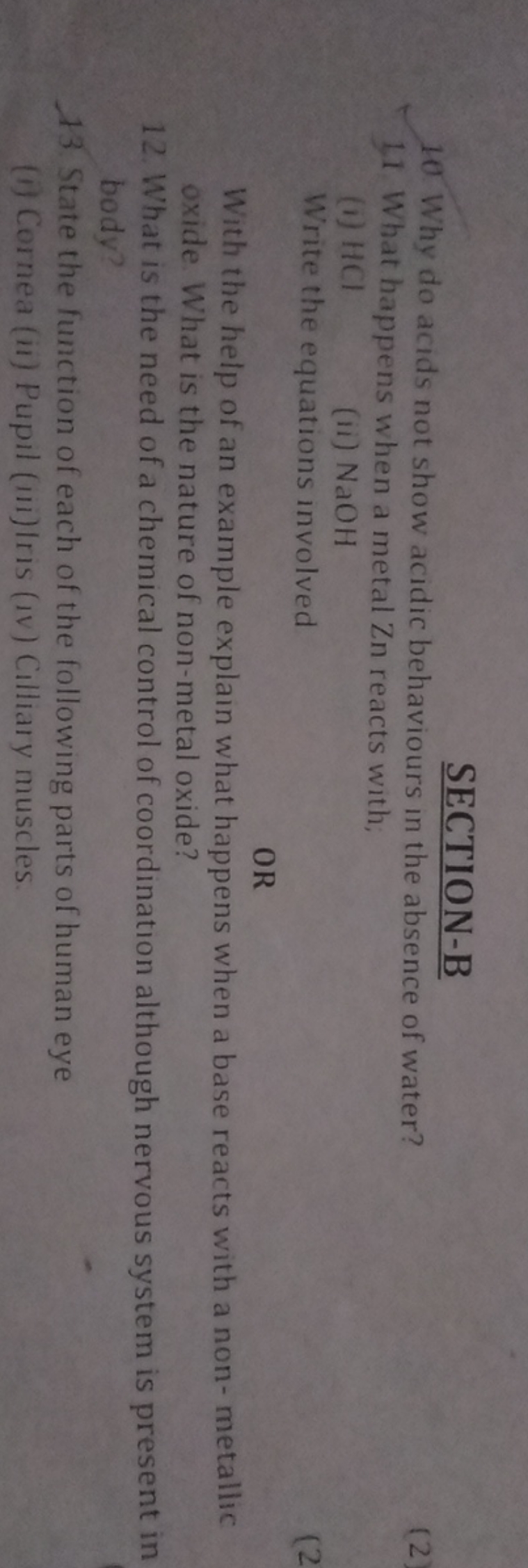 SECTION-B
10. Why do acids not show acidic behaviours in the absence o