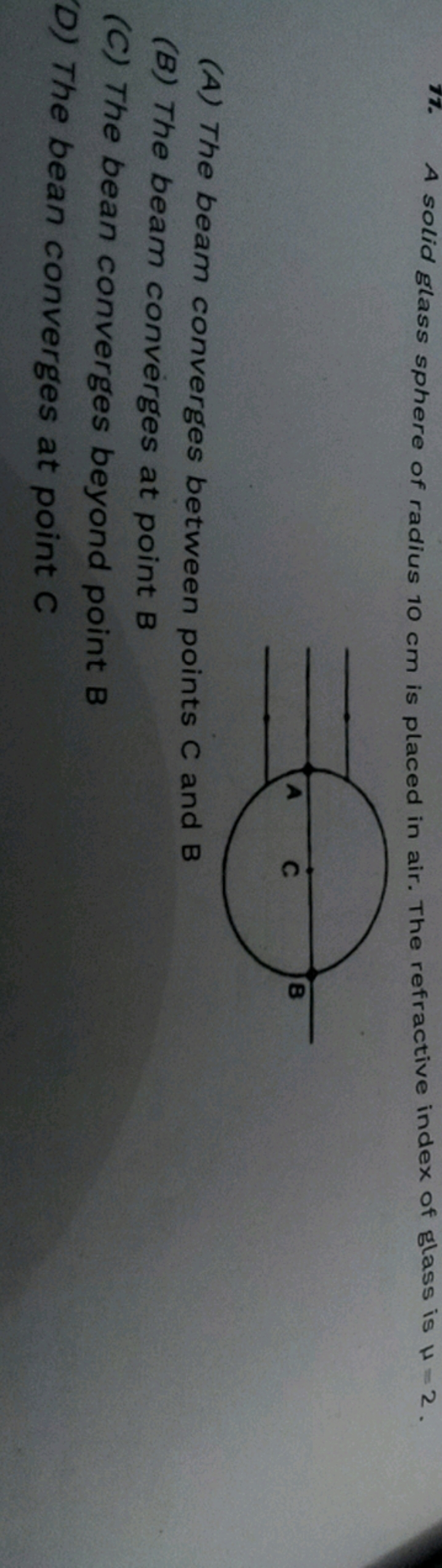 17. A solid glass sphere of radius 10 cm is placed in air. The refract