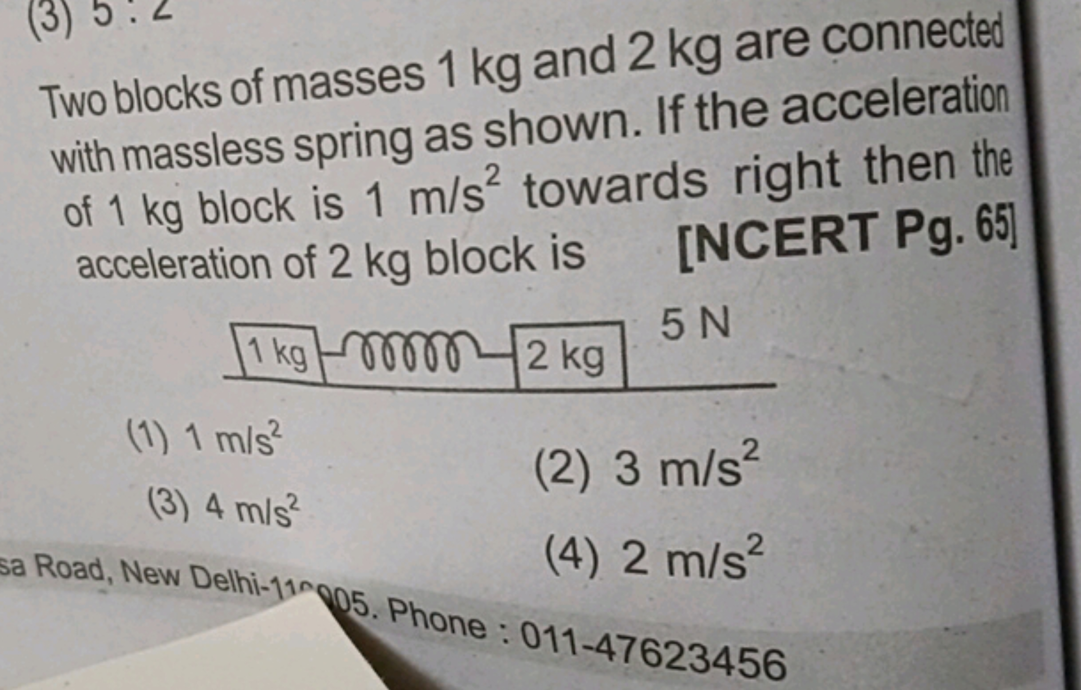 Two blocks of masses 1 kg and 2 kg are connected with massless spring 