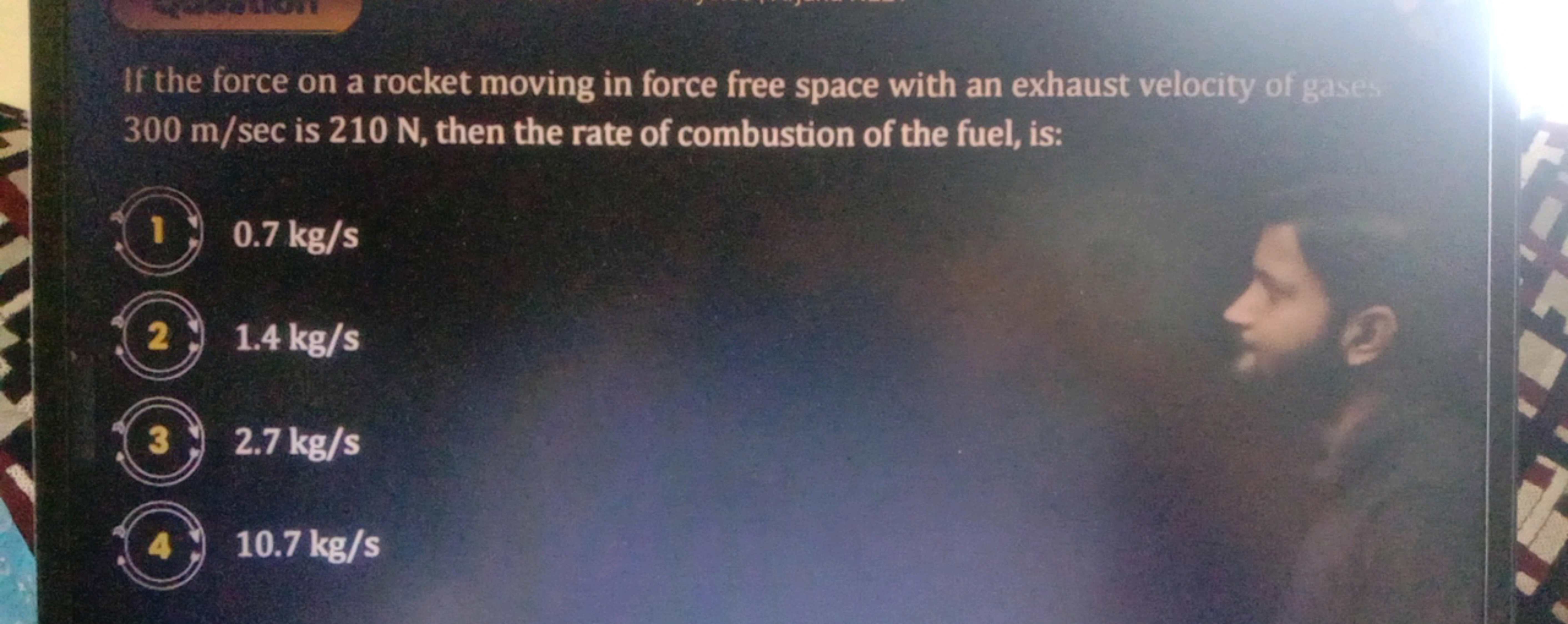 If the force on a rocket moving in force free space with an exhaust ve