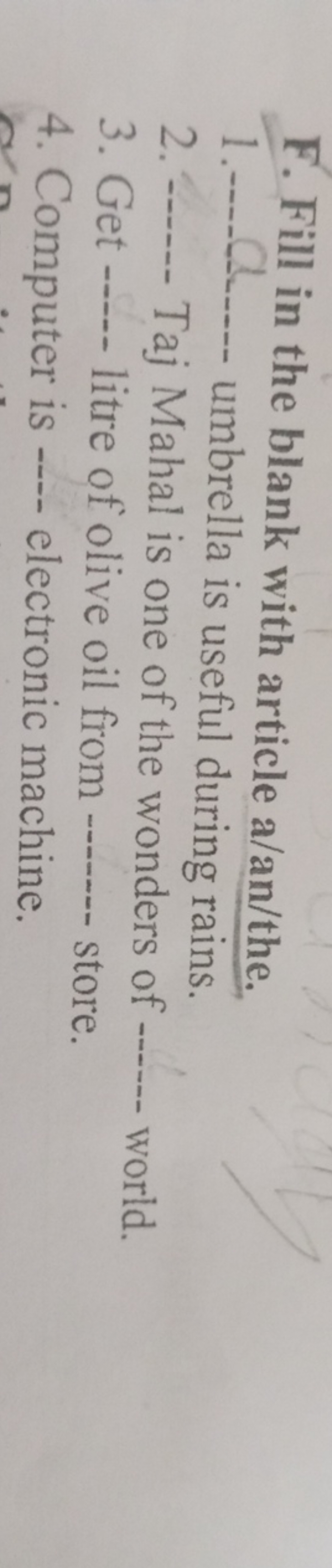 F. Fill in the blank with article a/an/the.
1.-  umbrella is useful du