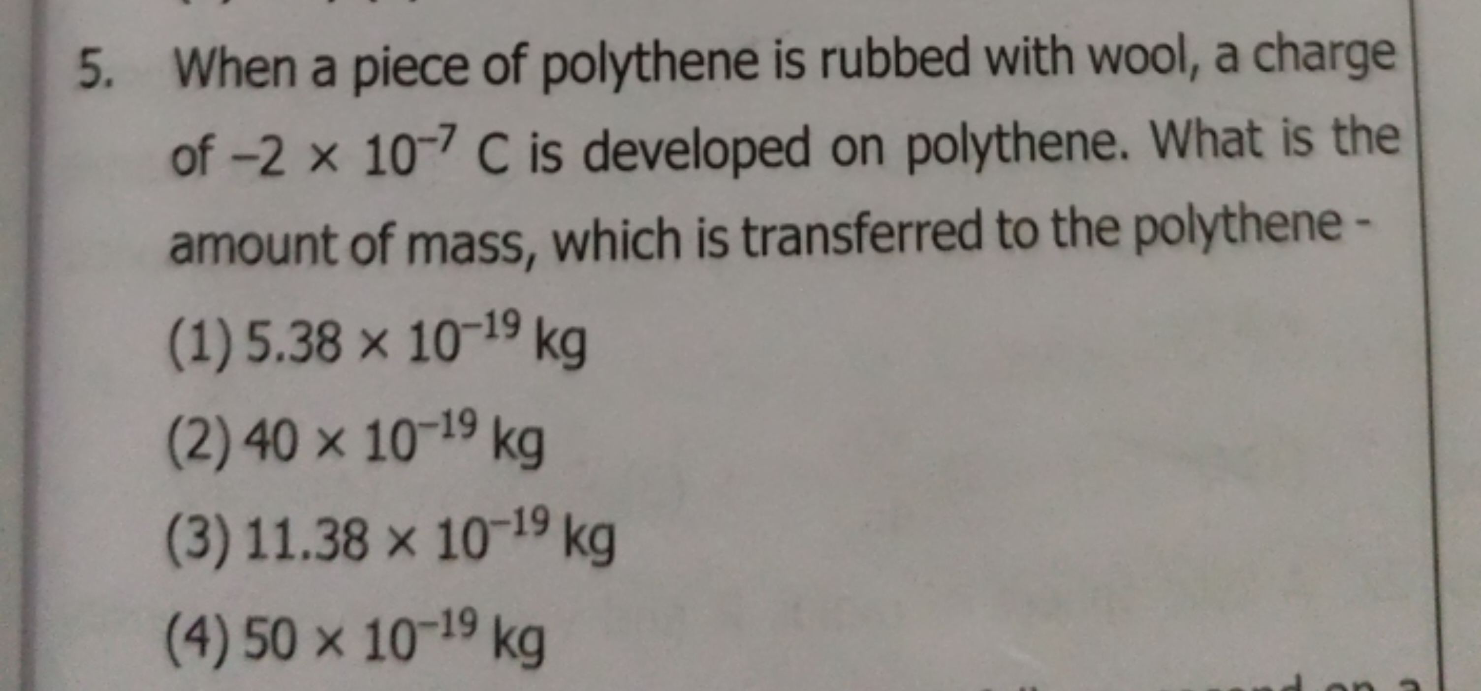 5. When a piece of polythene is rubbed with wool, a charge of −2×10−7C