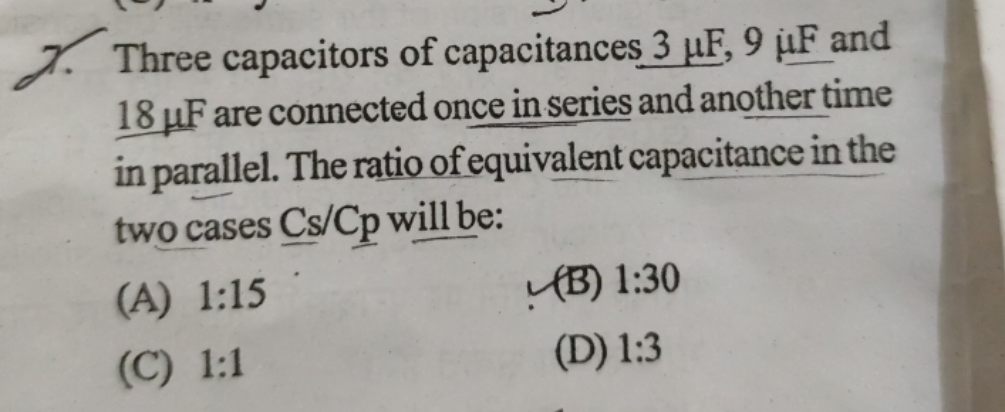 7. Three capacitors of capacitances 3μF,9μF and 18μF are connected onc