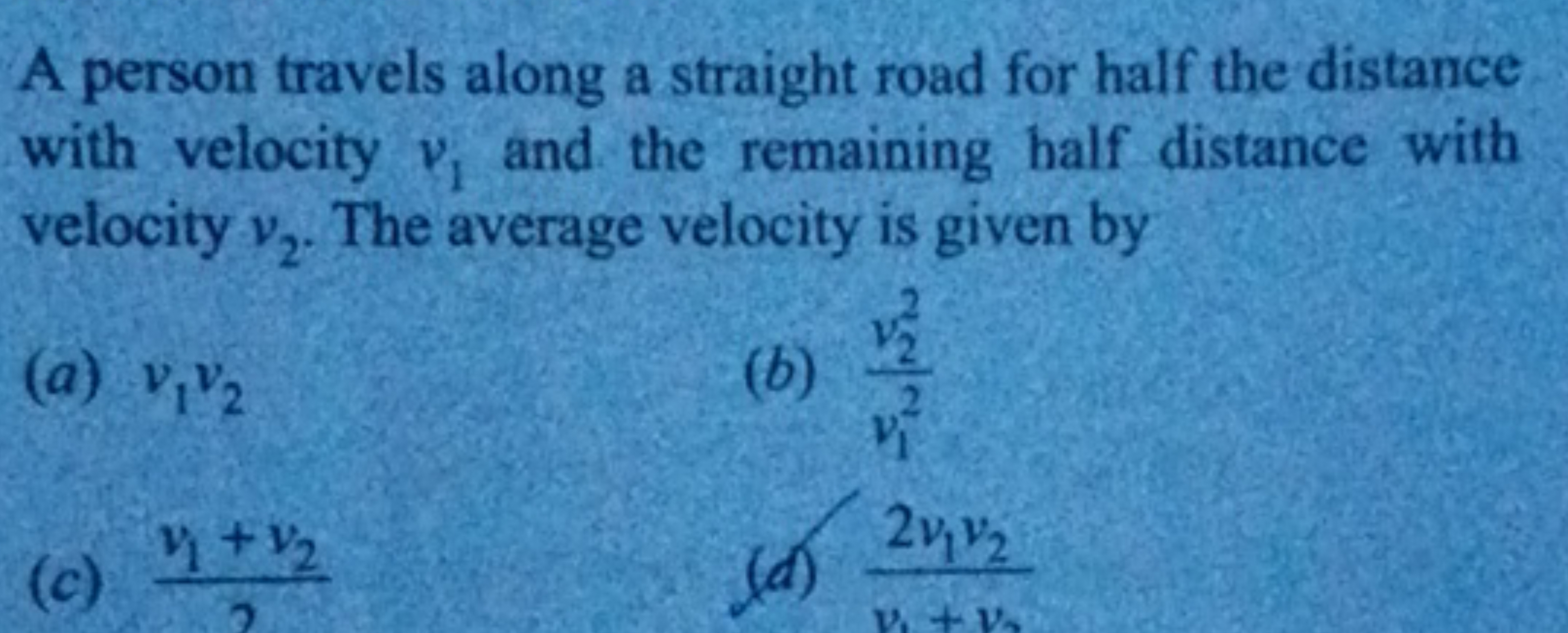 A person travels along a straight road for half the distance with velo