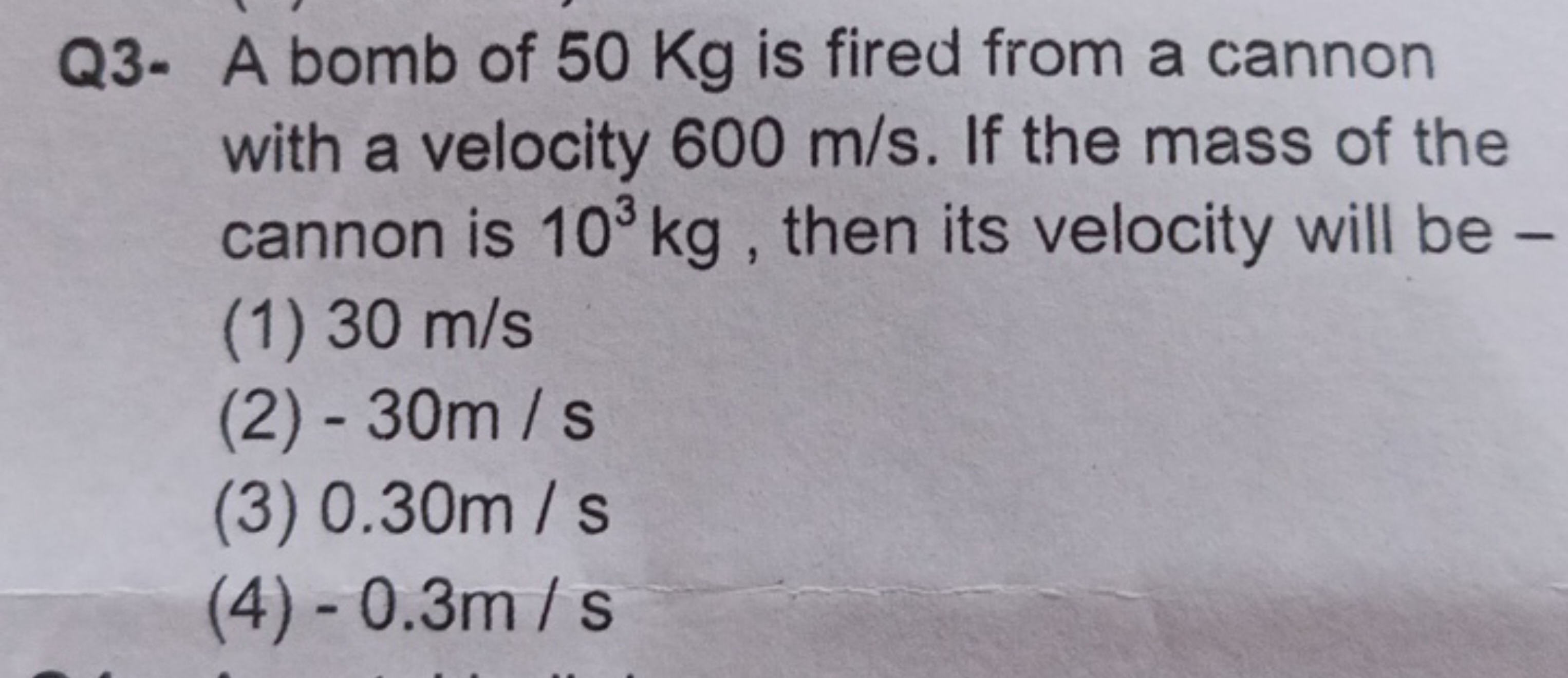 Q3- A bomb of 50 Kg is fired from a cannon with a velocity 600 m/s. If