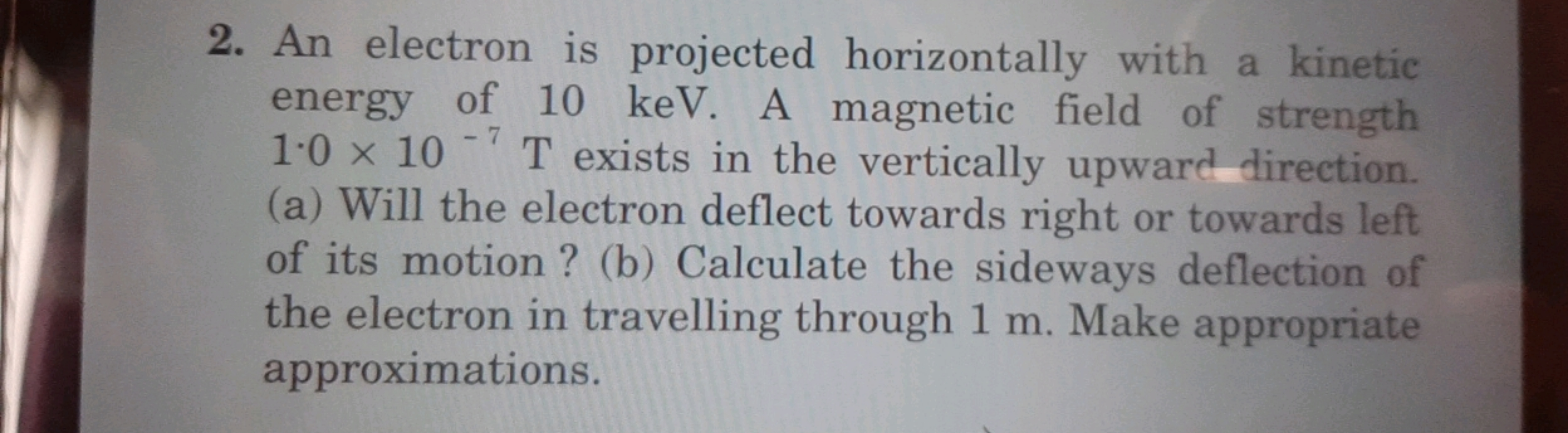 2. An electron is projected horizontally with a kinetic energy of 10 k