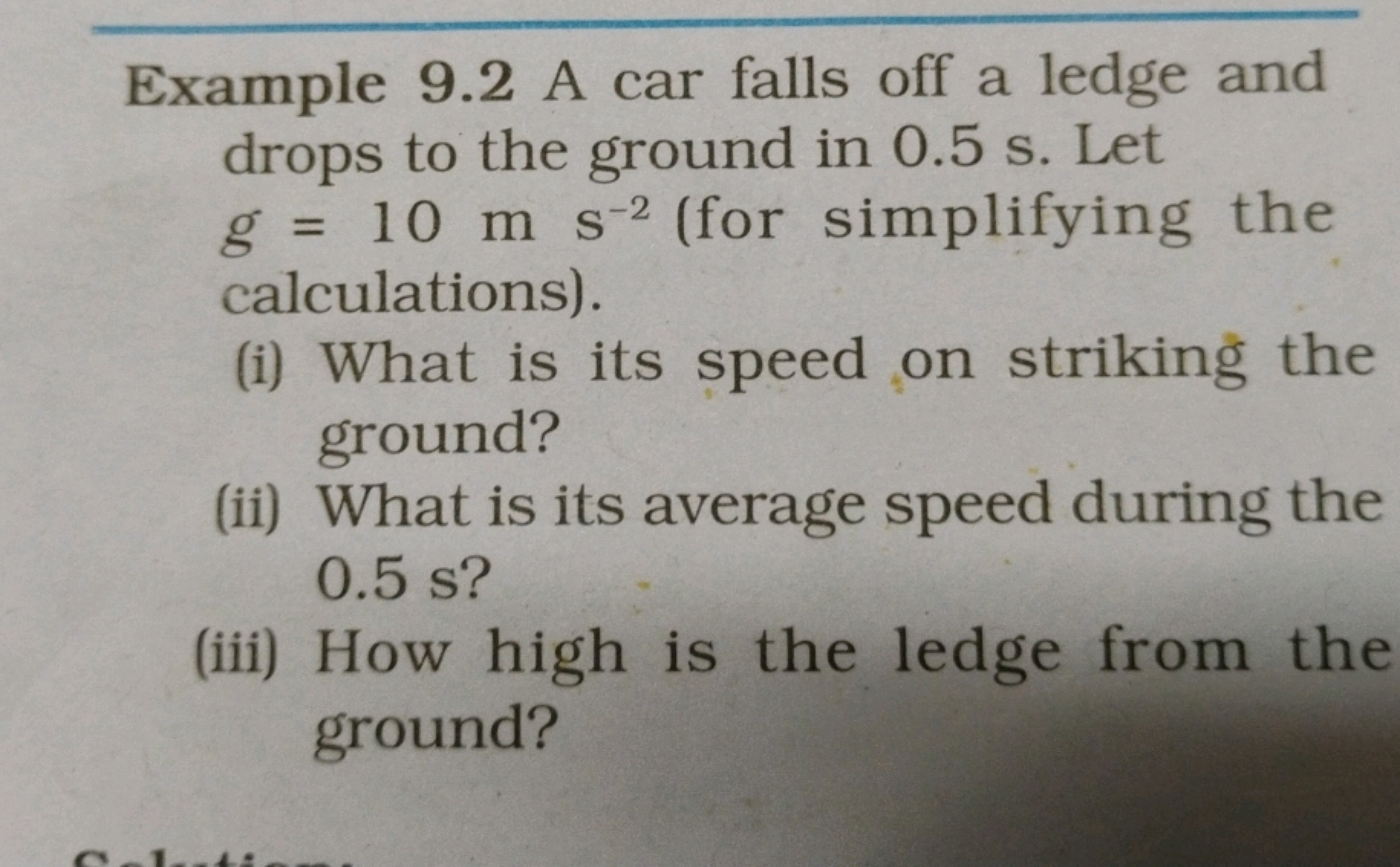 Example 9.2 A car falls off a ledge and drops to the ground in 0.5 s .