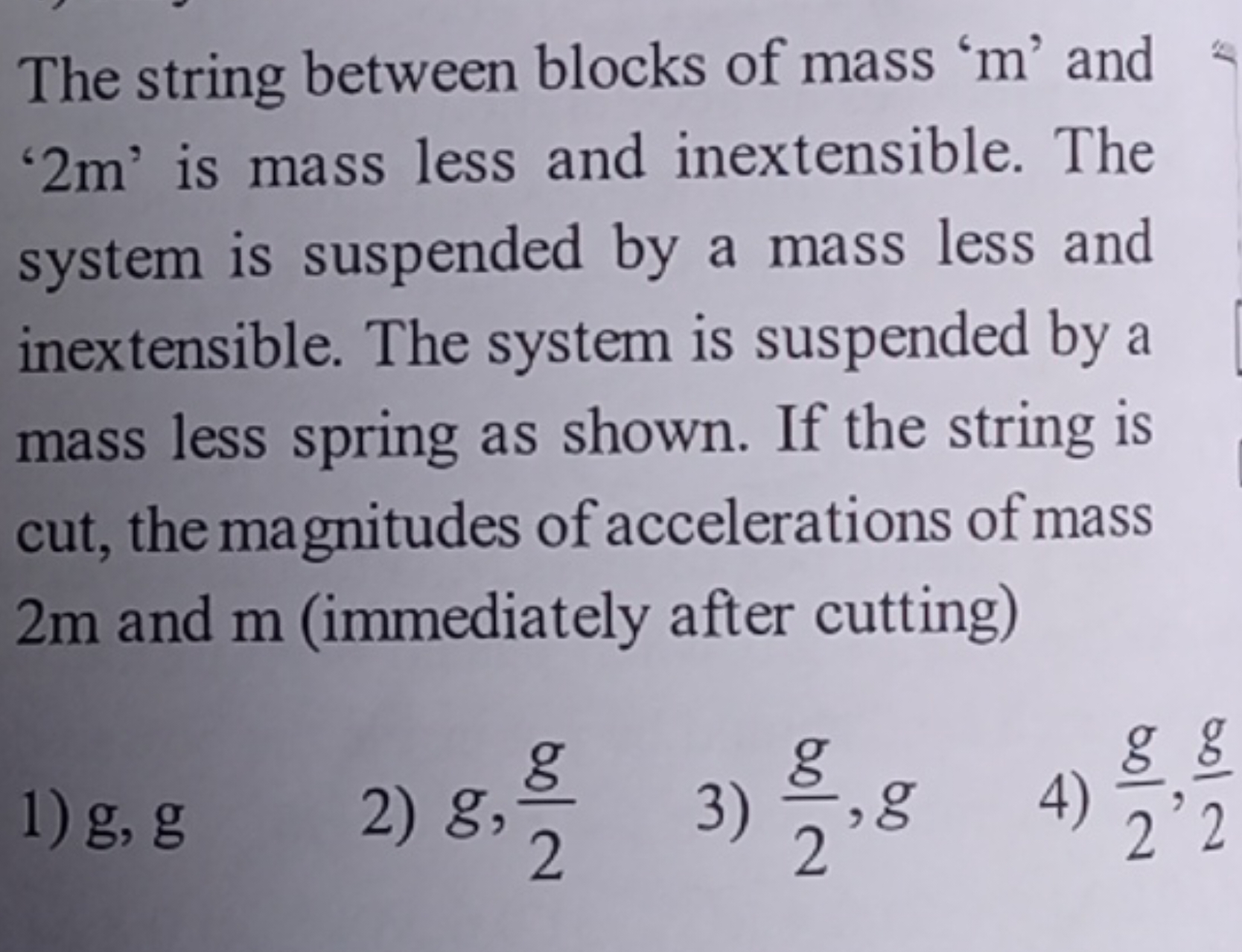 The string between blocks of mass ' m ' and ' 2 m ' is mass less and i