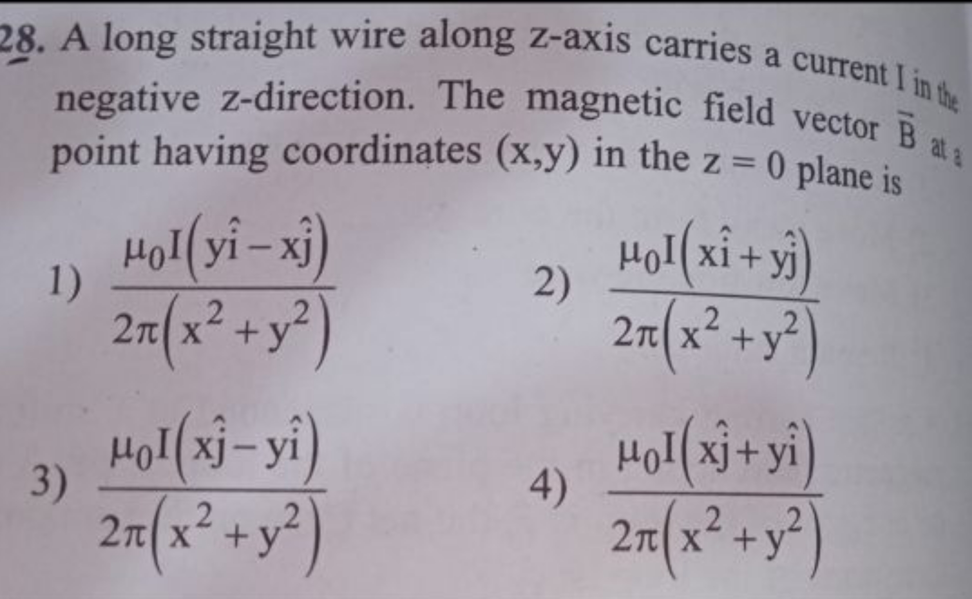 28. A long straight wire along z-axis carries a current Iin ​ negative