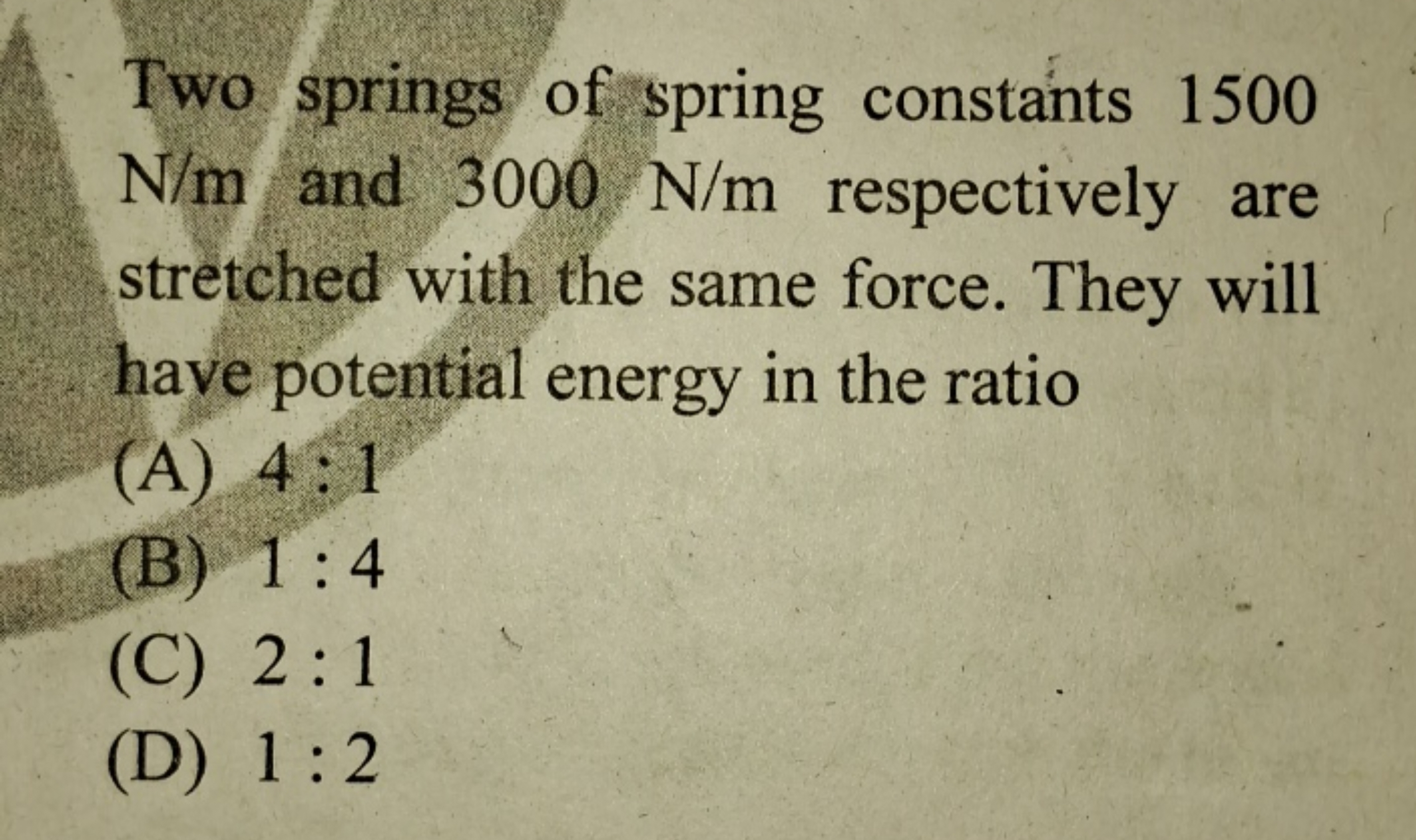 Two springs of spring constants 1500 N/m and 3000 N/m respectively are