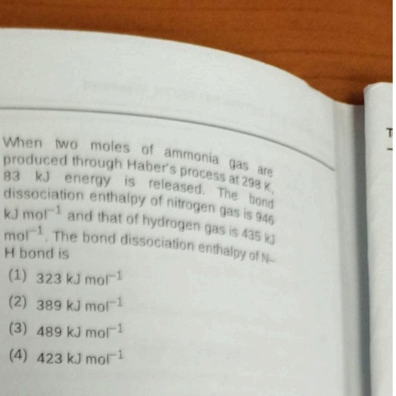 When two moles of ammonia gas are produced through Haber's process at 