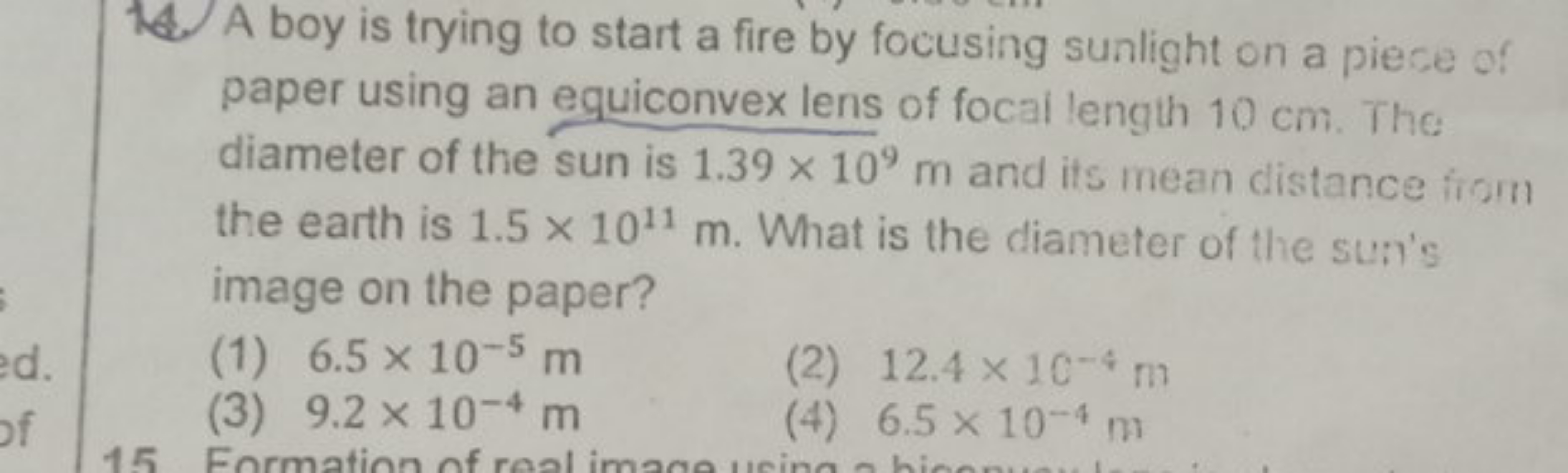 14. A boy is trying to start a fire by focusing sunlight on a piece of