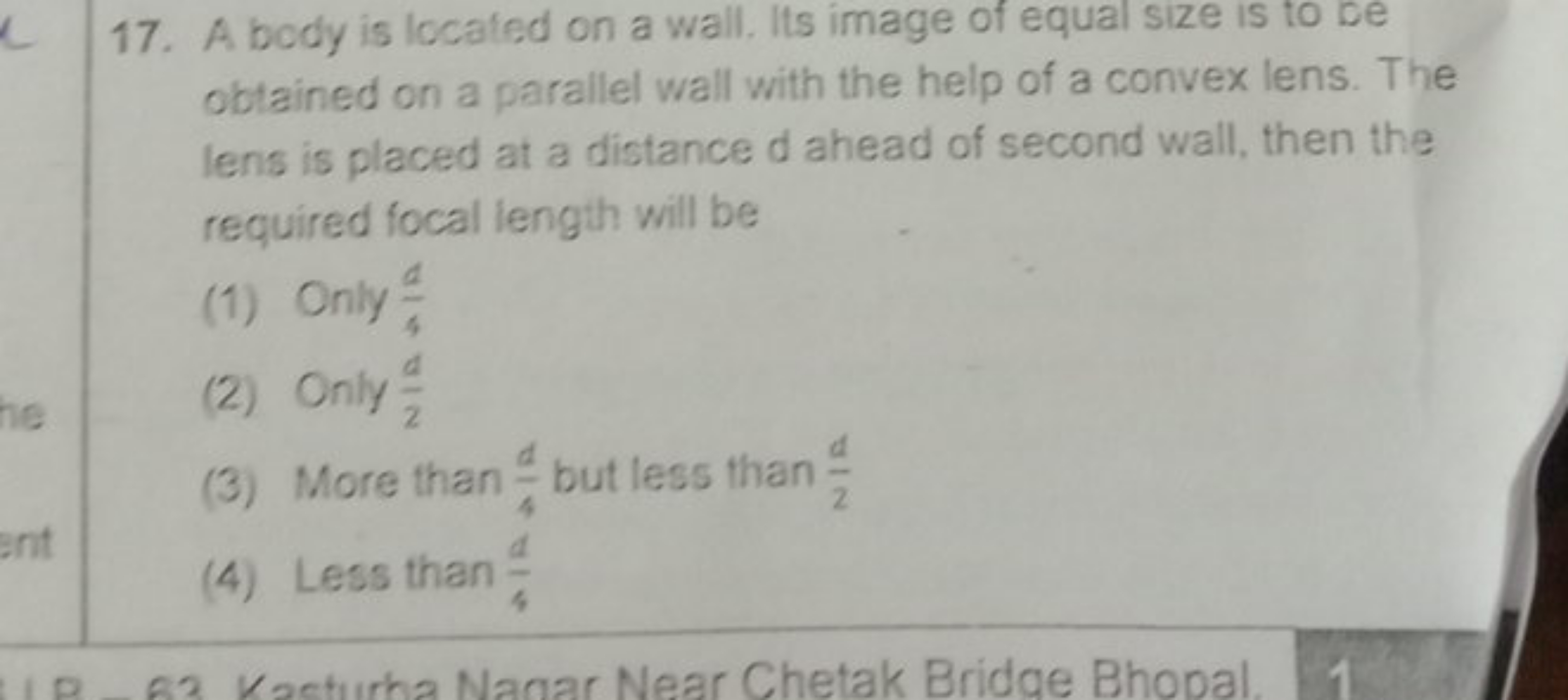 17. A body is located on a wall. Its image of equal size is to de obta