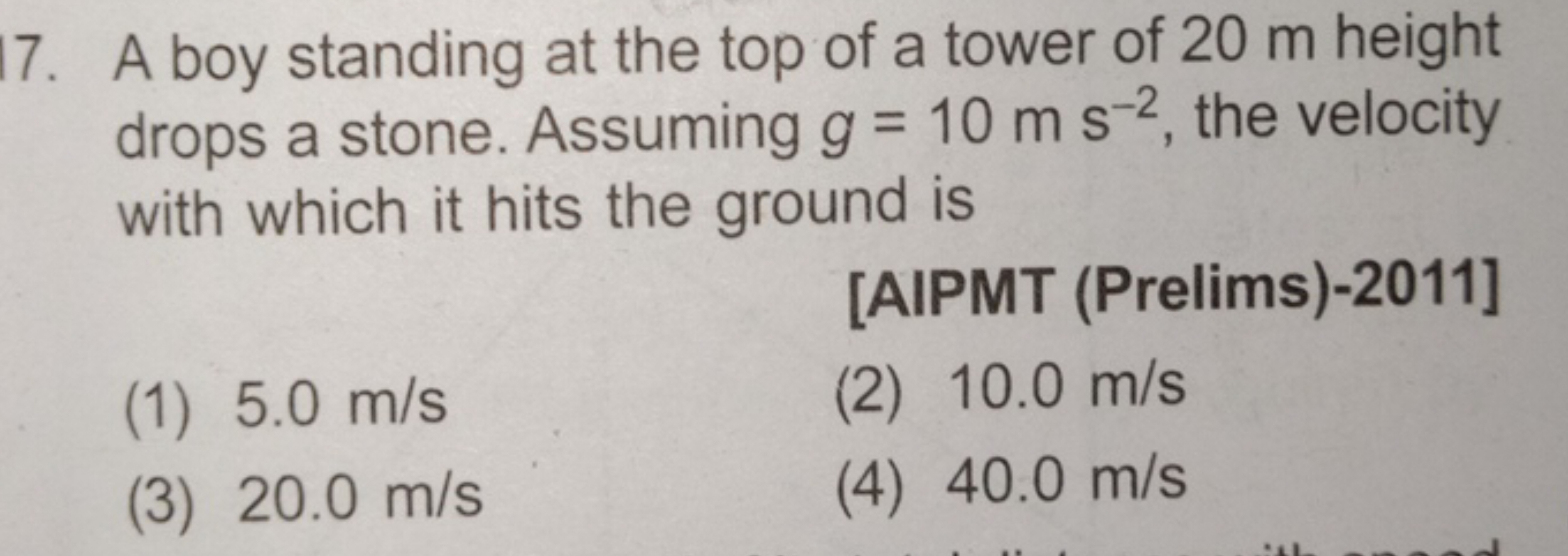 7. A boy standing at the top of a tower of 20 m height drops a stone. 