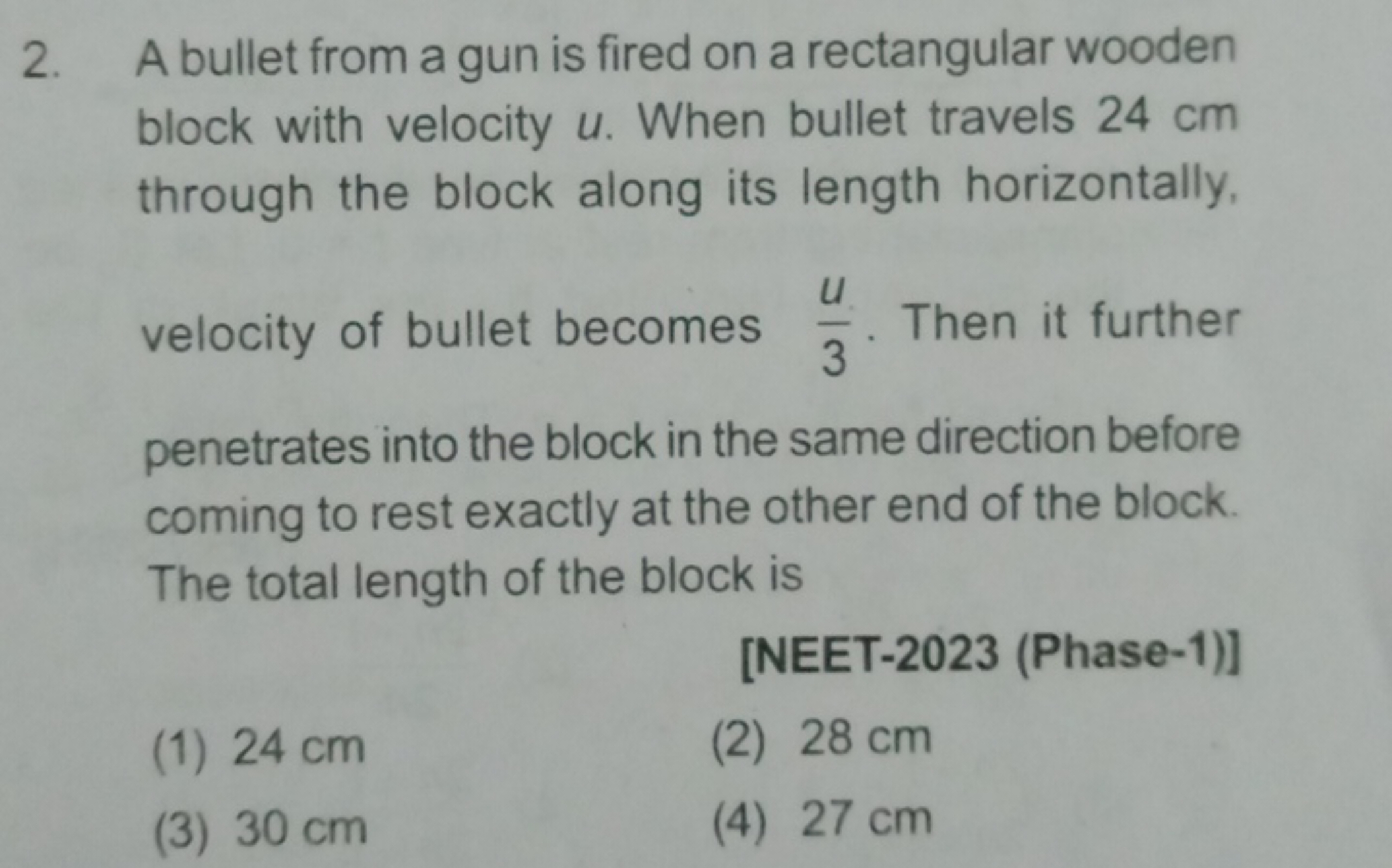 2. A bullet from a gun is fired on a rectangular wooden block with vel