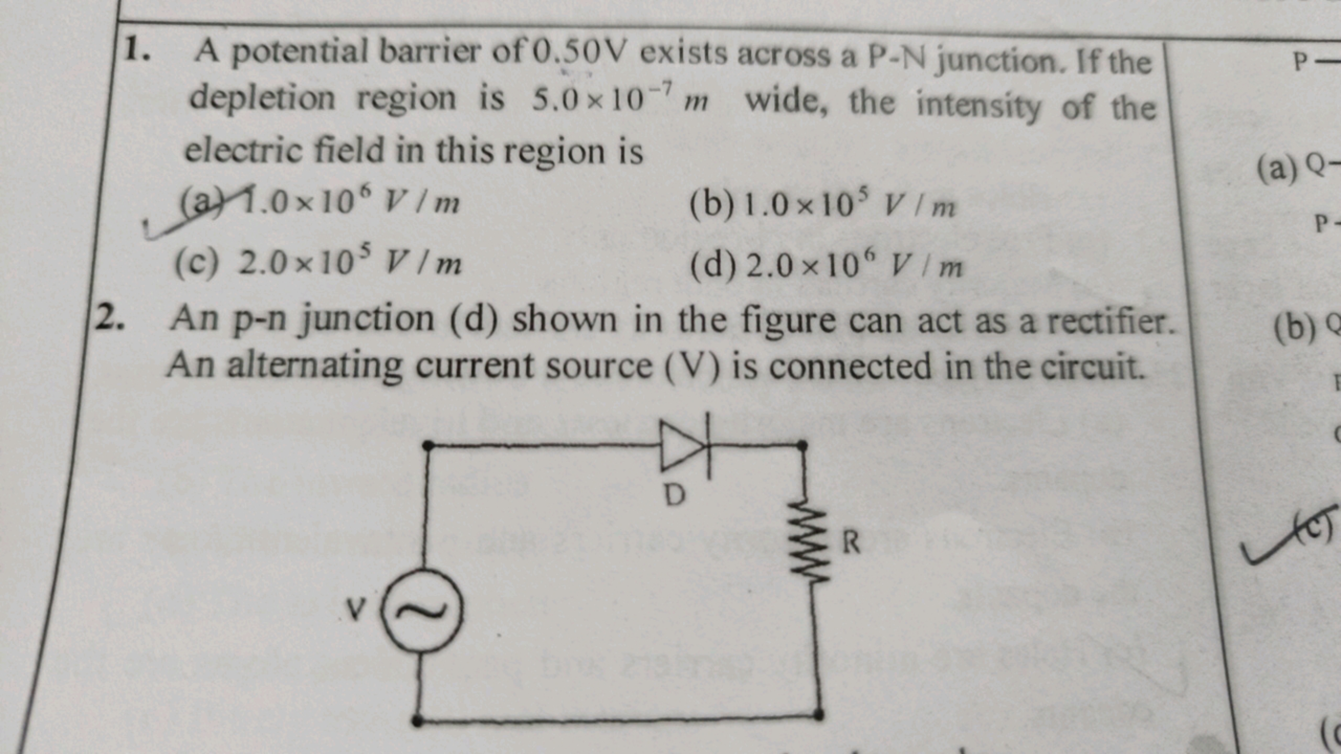 1. A potential barrier of 0.50 V exists across a P−N junction. If the 