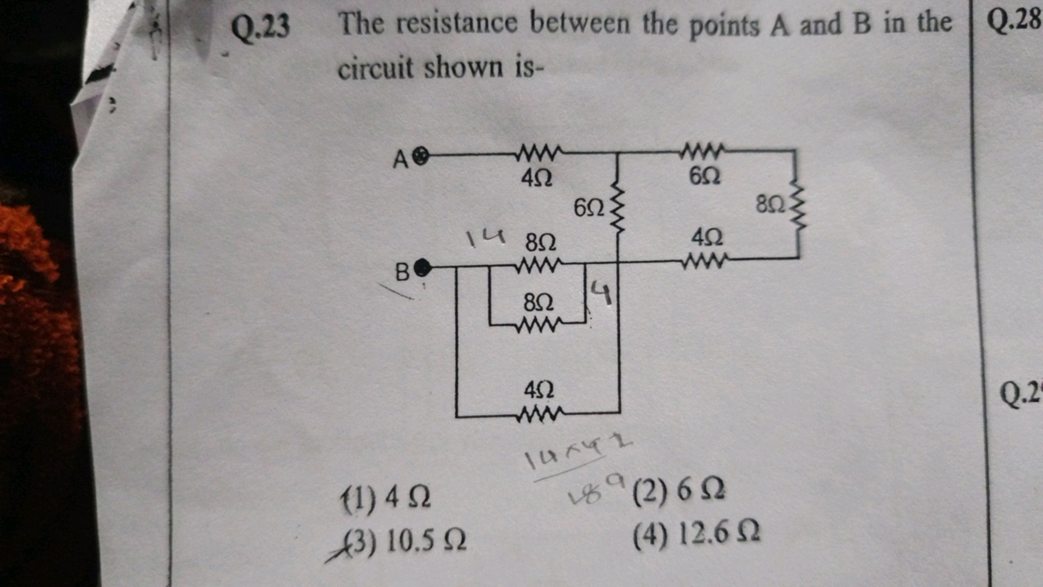 Q. 23 The resistance between the points A and B in the circuit shown i