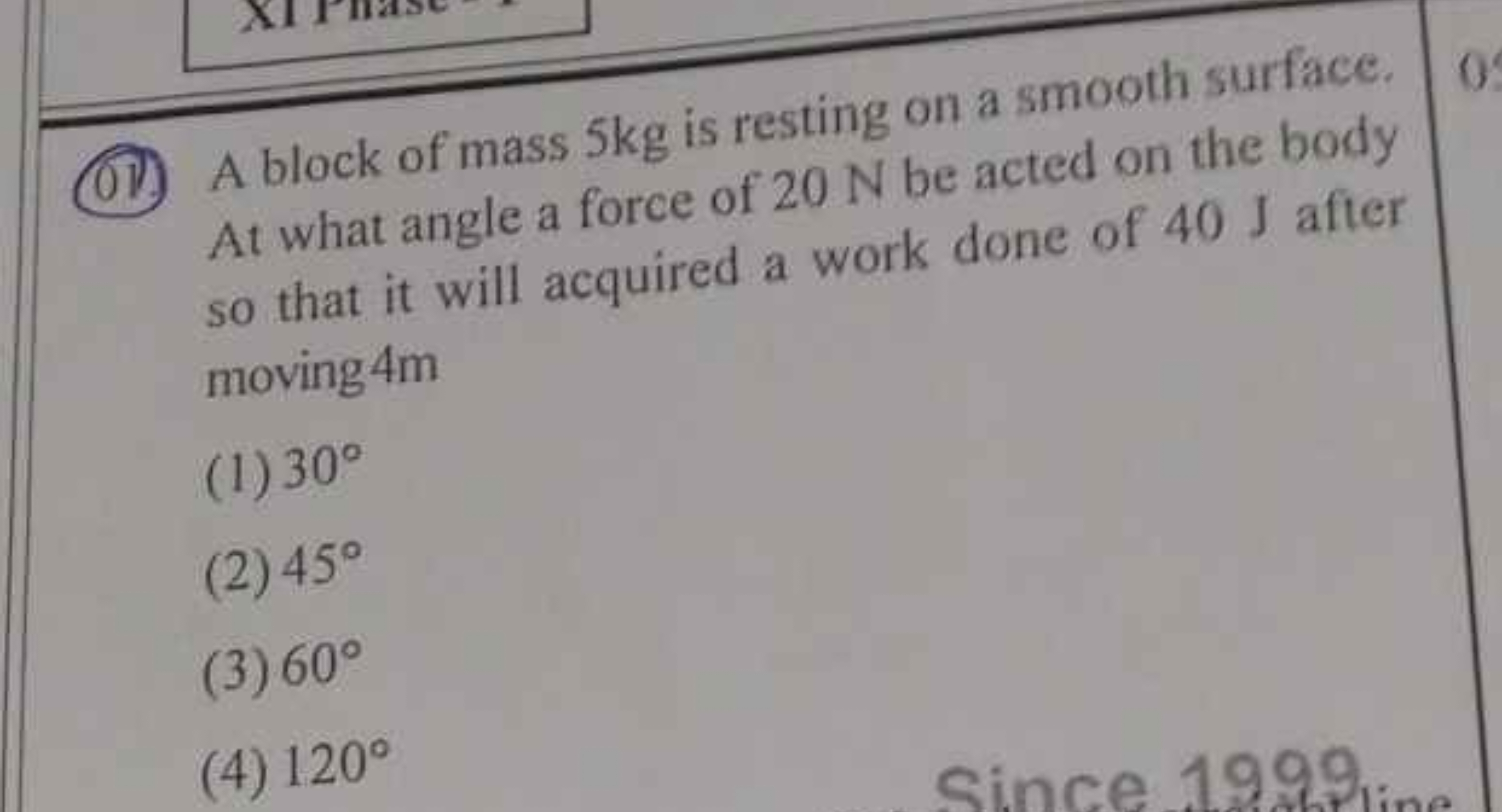 (01) A block of mass 5 kg is resting on a smooth surface. At what angl