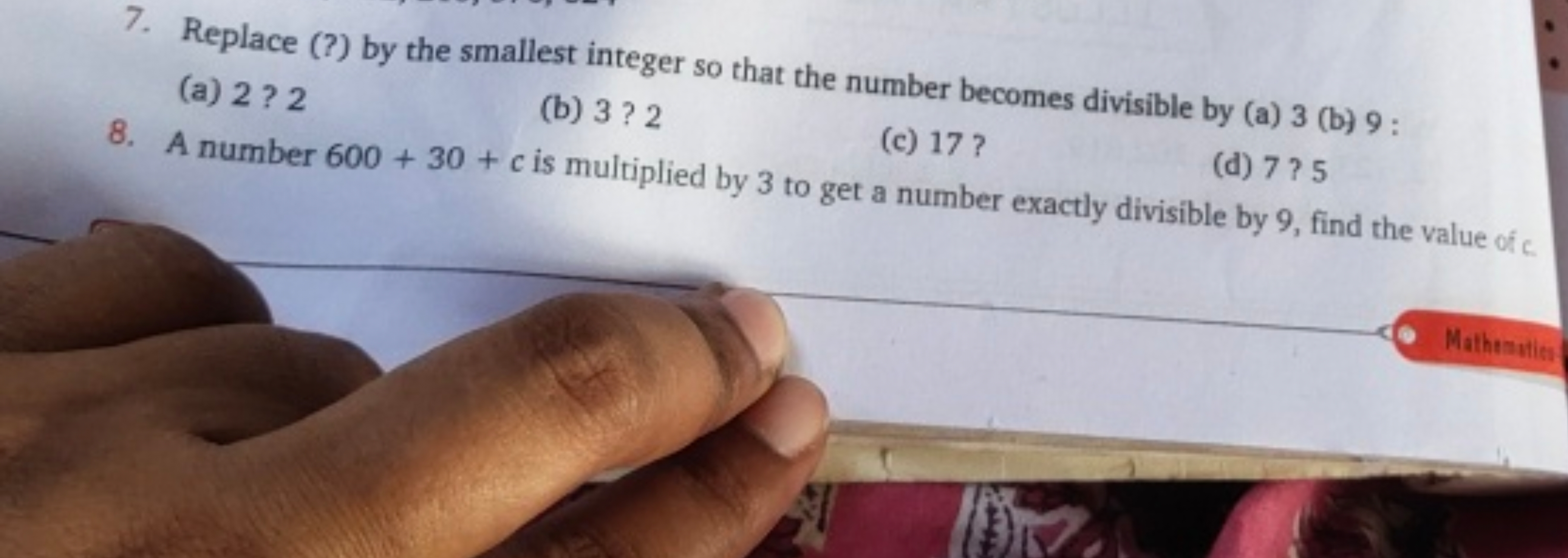 7. Replace (?) by the smallest integer so that the number becomes divi