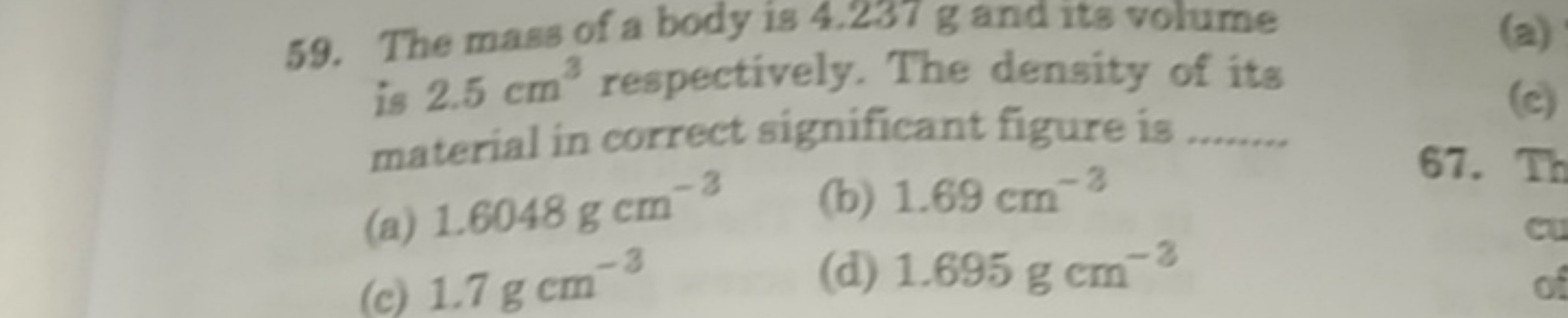 59. The mass of a body is 4.237 g and its volume is 2.5 cm3 respective