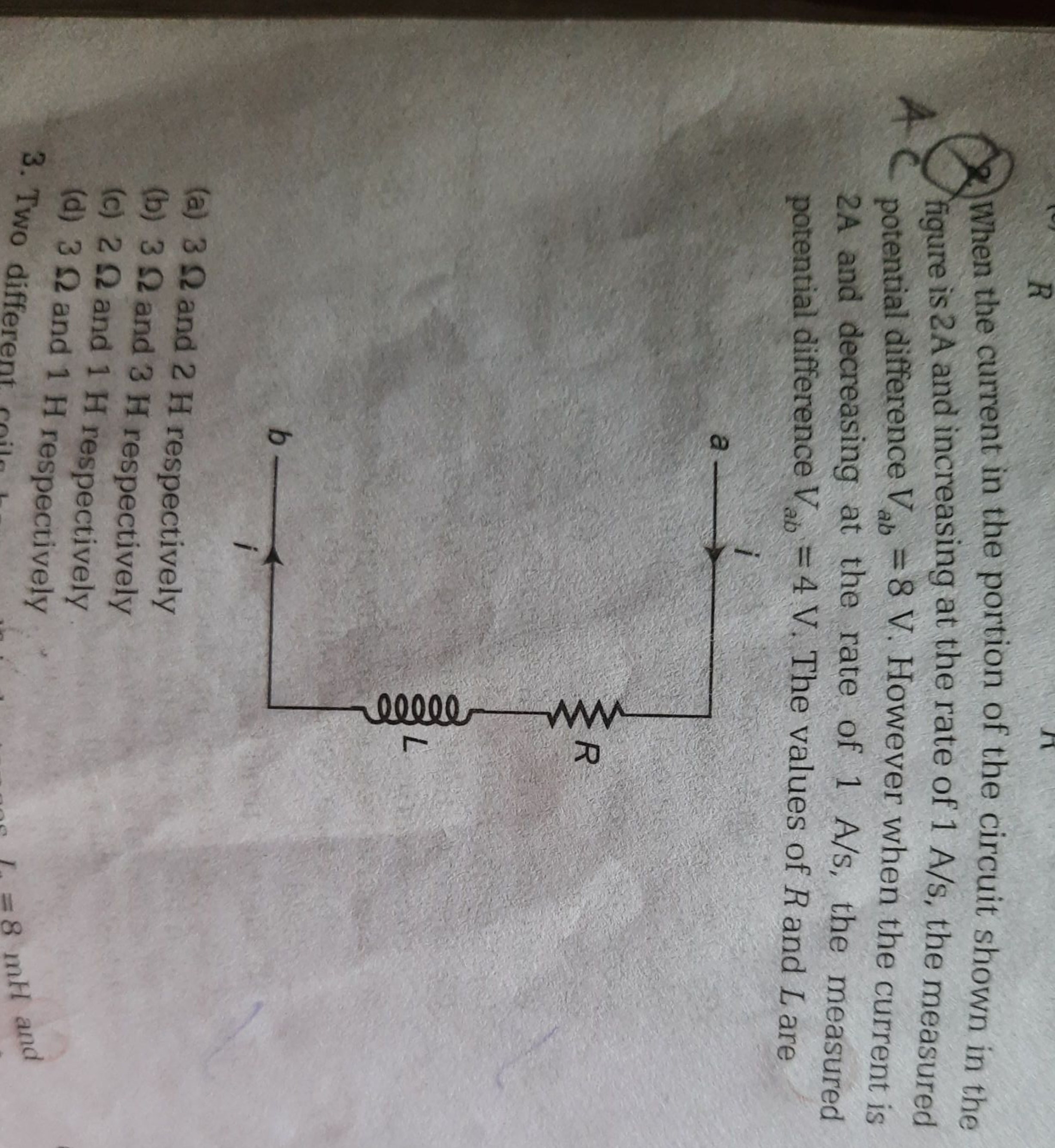 R
When the current in the portion of the circuit shown in the figure i