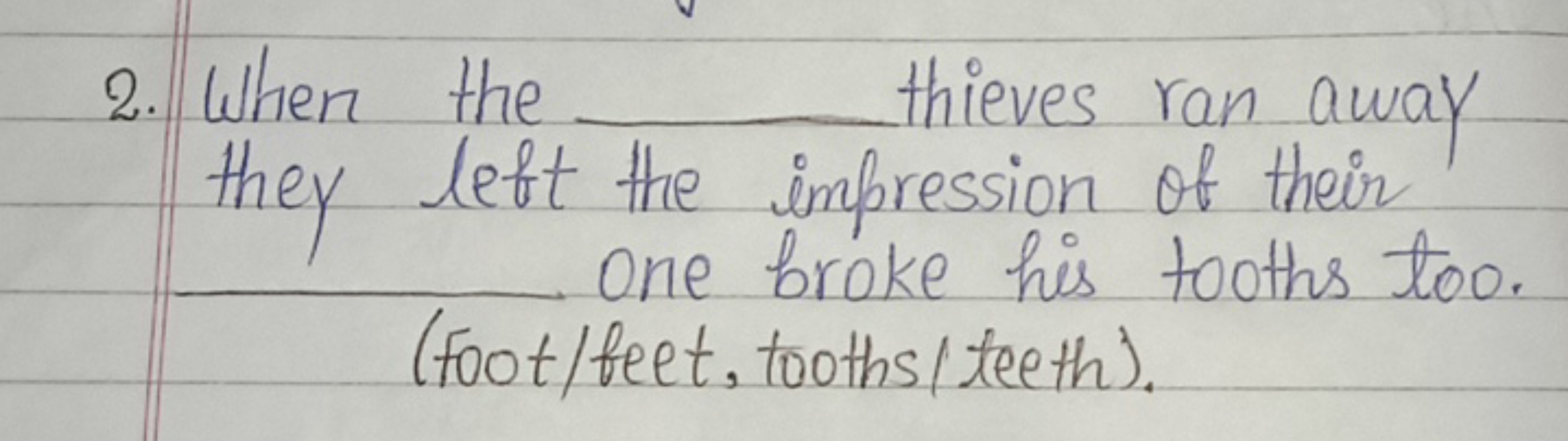 2. When the  thieves ran away they left the impression of their  One b