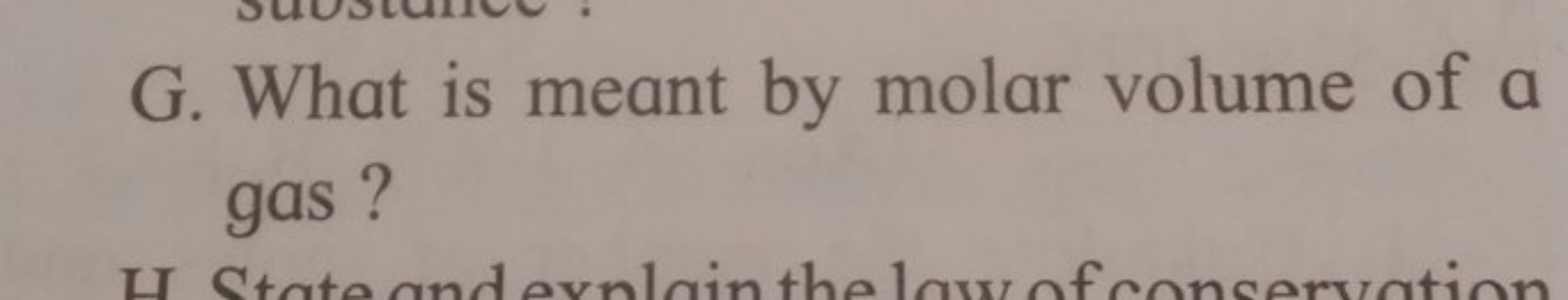 G . What is meant by molar volume of a gas ?