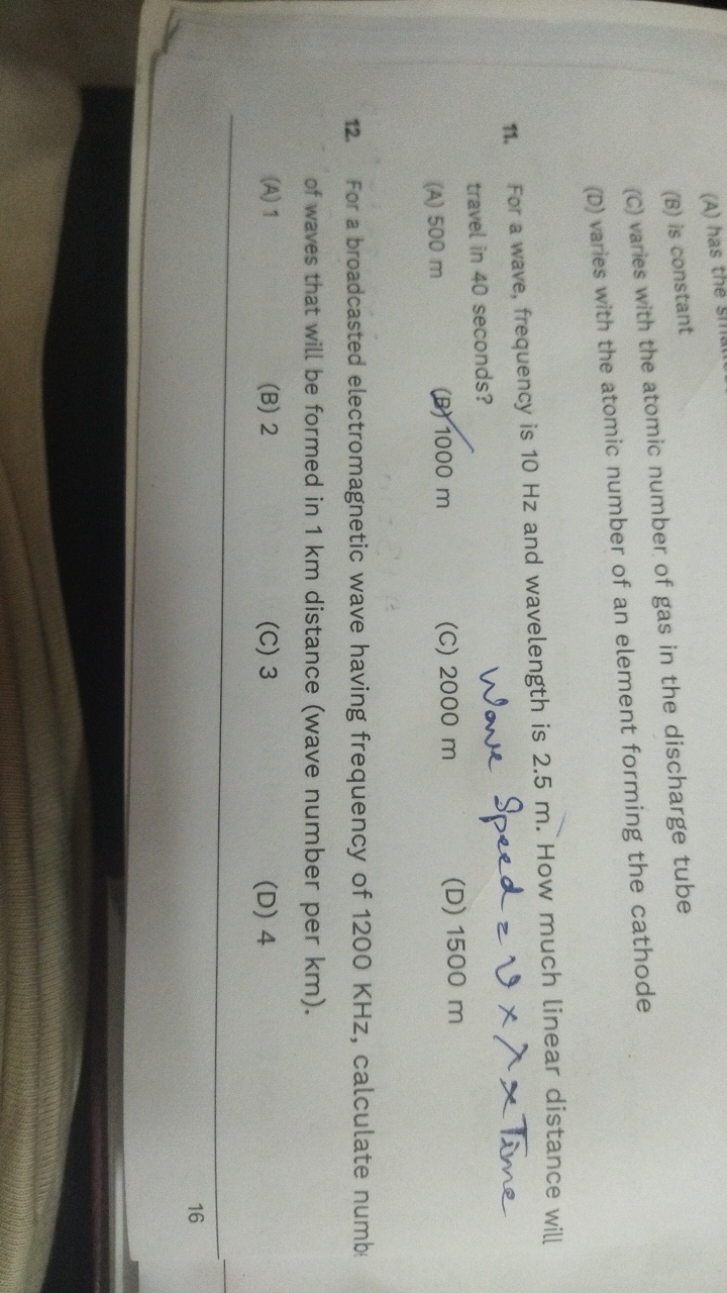 (C) varies with the atomic number of gas in the discharge tube
(B) is 