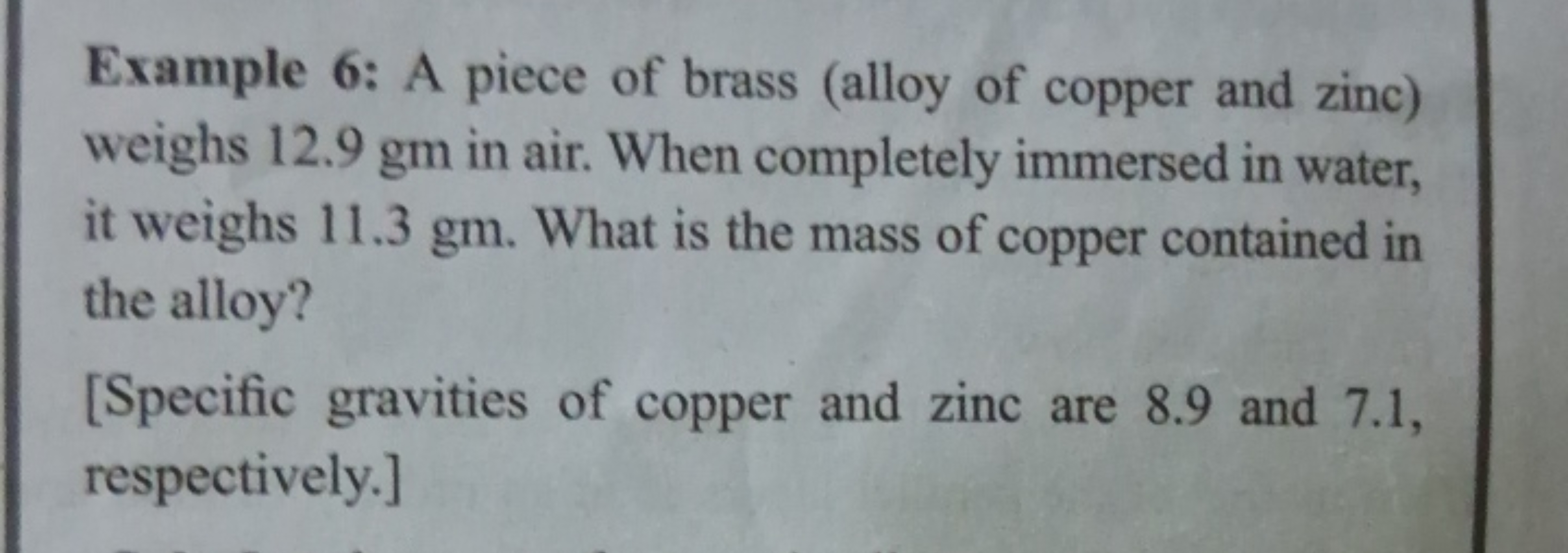 Example 6: A piece of brass (alloy of copper and zinc) weighs 12.9 gm 