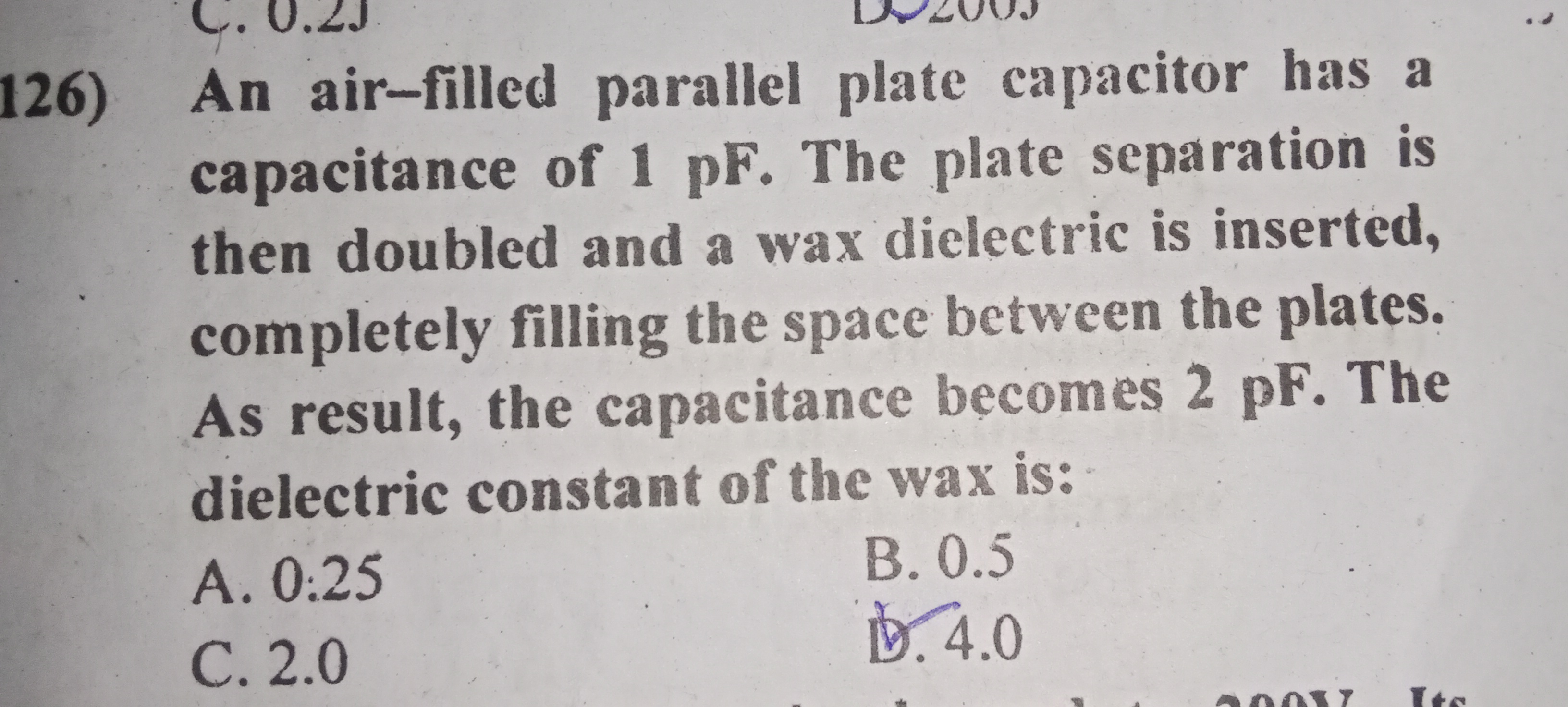 126) An air-filled parallel plate capacitor has a capacitance of 1 pF 