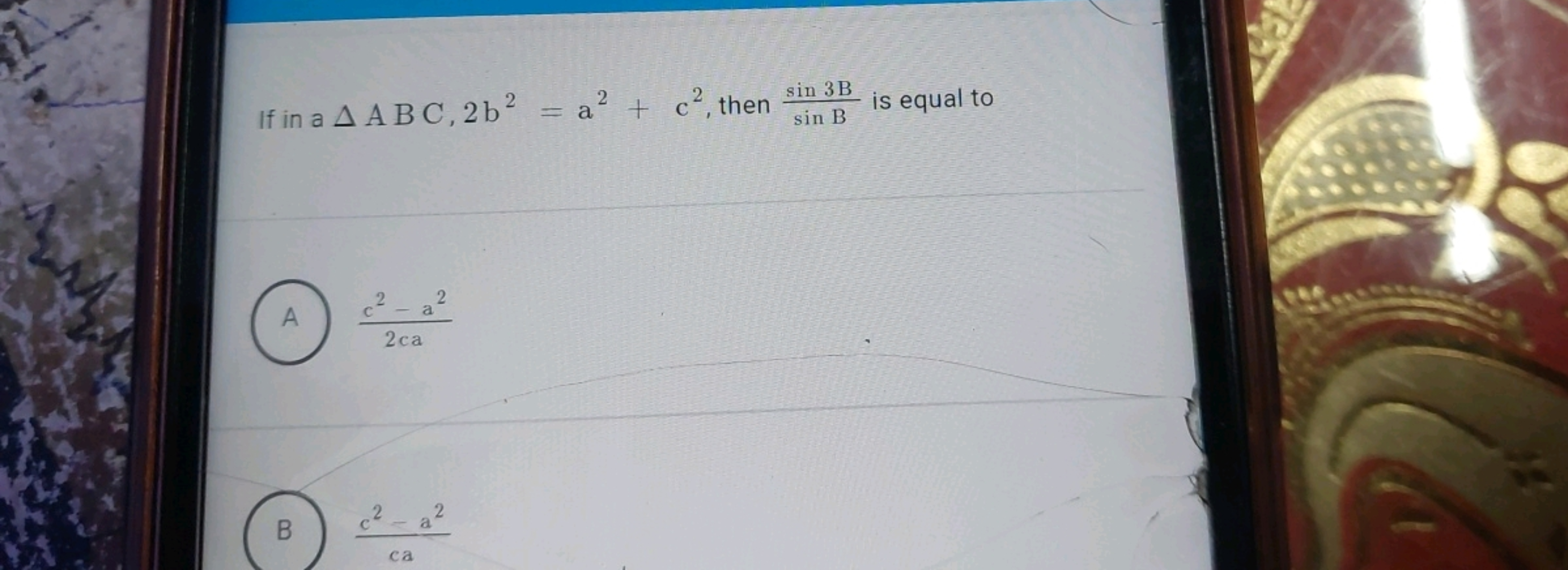 If in a A ABC, 2b2 = a² +
=a2+
2
c², then
c², then sin 3B
is equal to
