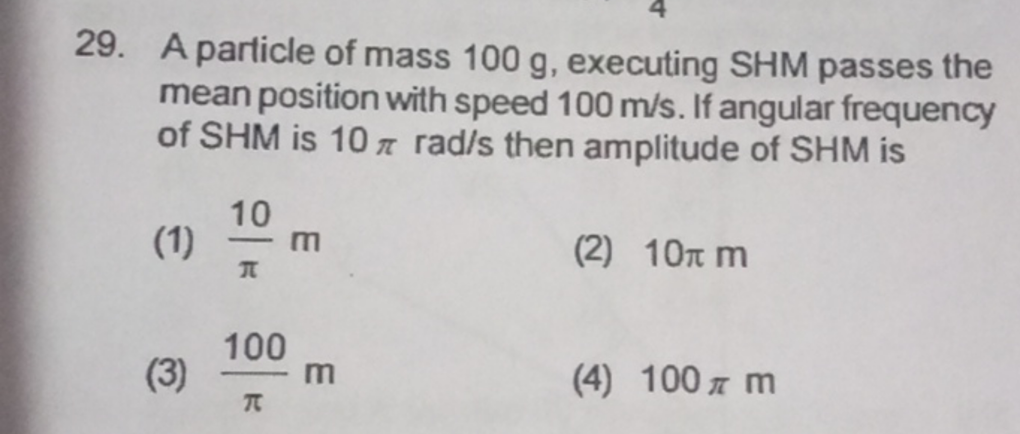 29. A particle of mass 100 g , executing SHM passes the mean position 